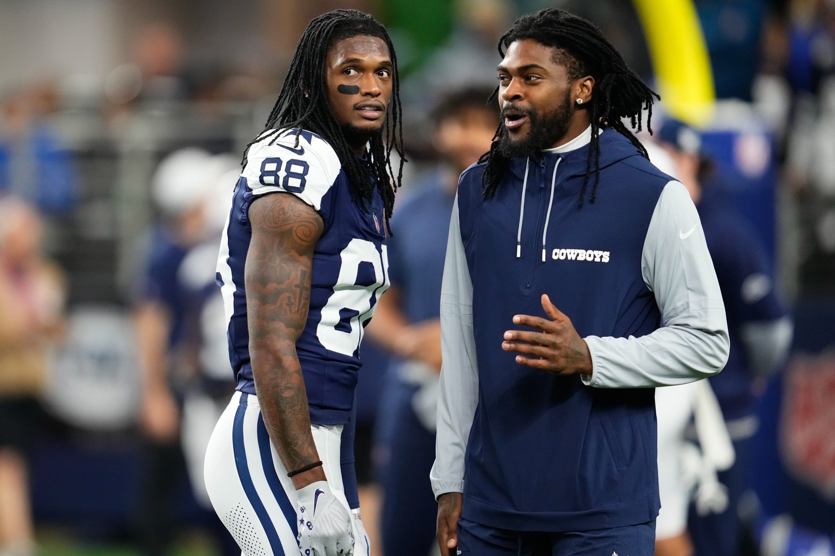 Nov 28, 2024; Arlington, Texas, USA; Dallas Cowboys wide receiver CeeDee Lamb (88) and cornerback Trevon Diggs (7) during pregame warmups before the game against the New York Giants at AT&T Stadium.