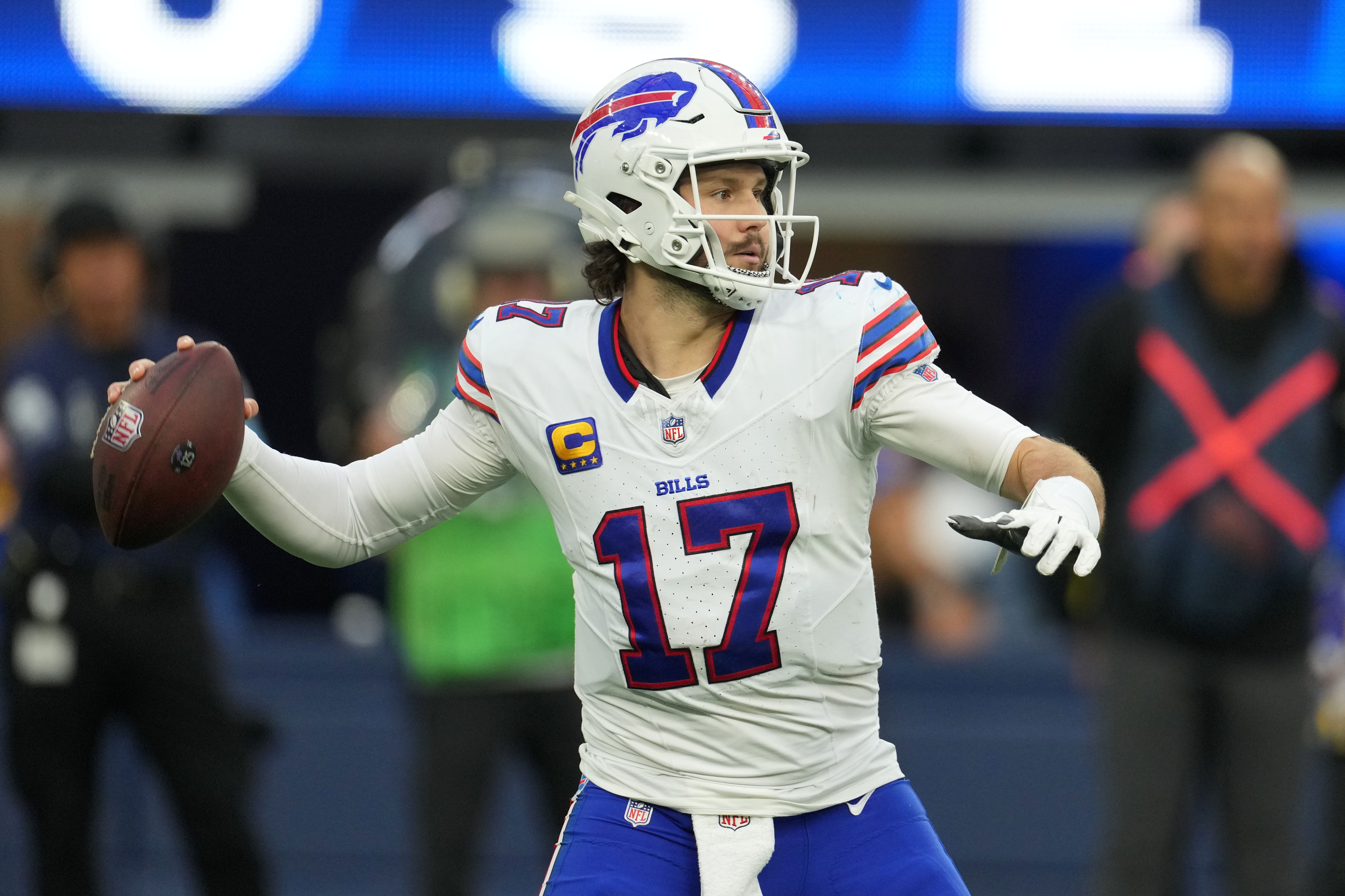 Dec 8, 2024; Inglewood, California, USA; Buffalo Bills quarterback Josh Allen (17) throws the ball against the Los Angeles Rams in the second half at SoFi Stadium.
