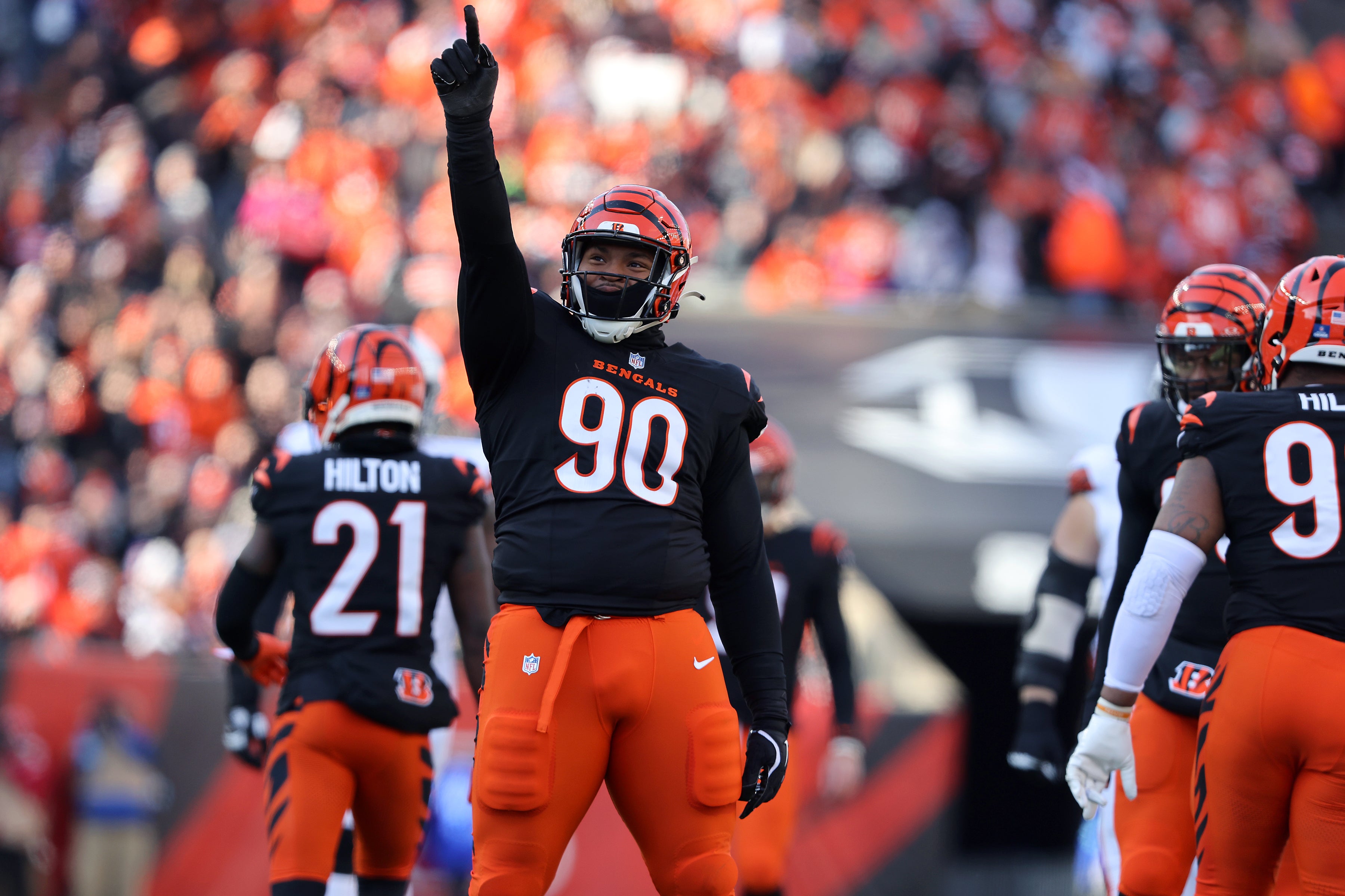 Cleveland Browns quarterback Joe Flacco (15) is chased out of bounds by Cincinnati Bengals defensive tackle Kris Jenkins Jr. (90) during the second half of an NFL football game at Huntington Bank Field, Sept. 7, 2025, in Cleveland, Ohio.