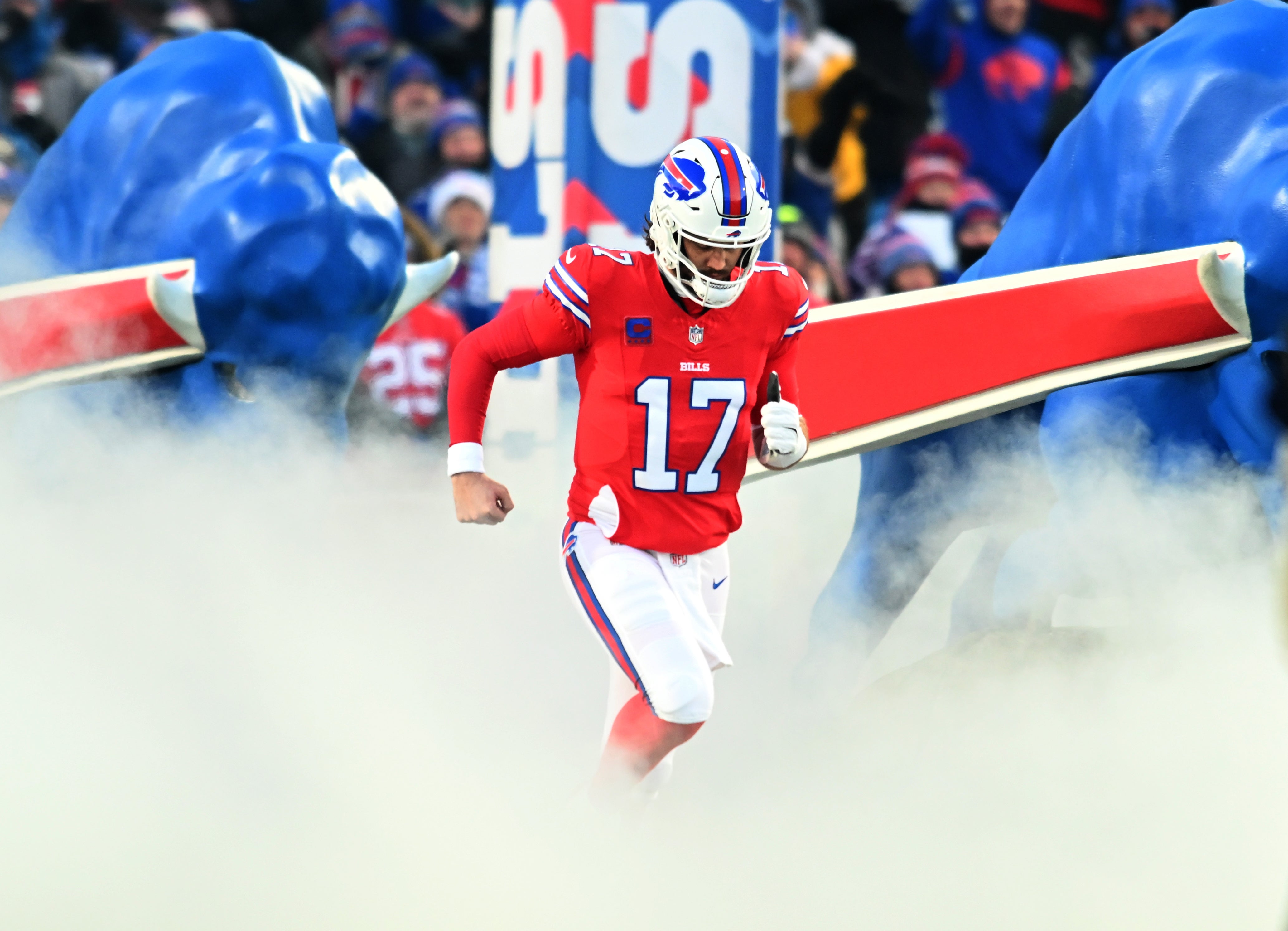 Dec 22, 2024; Orchard Park, New York, USA; Buffalo Bills quarterback Josh Allen (17) enters the field before a game against the New England Patriots at Highmark Stadium.