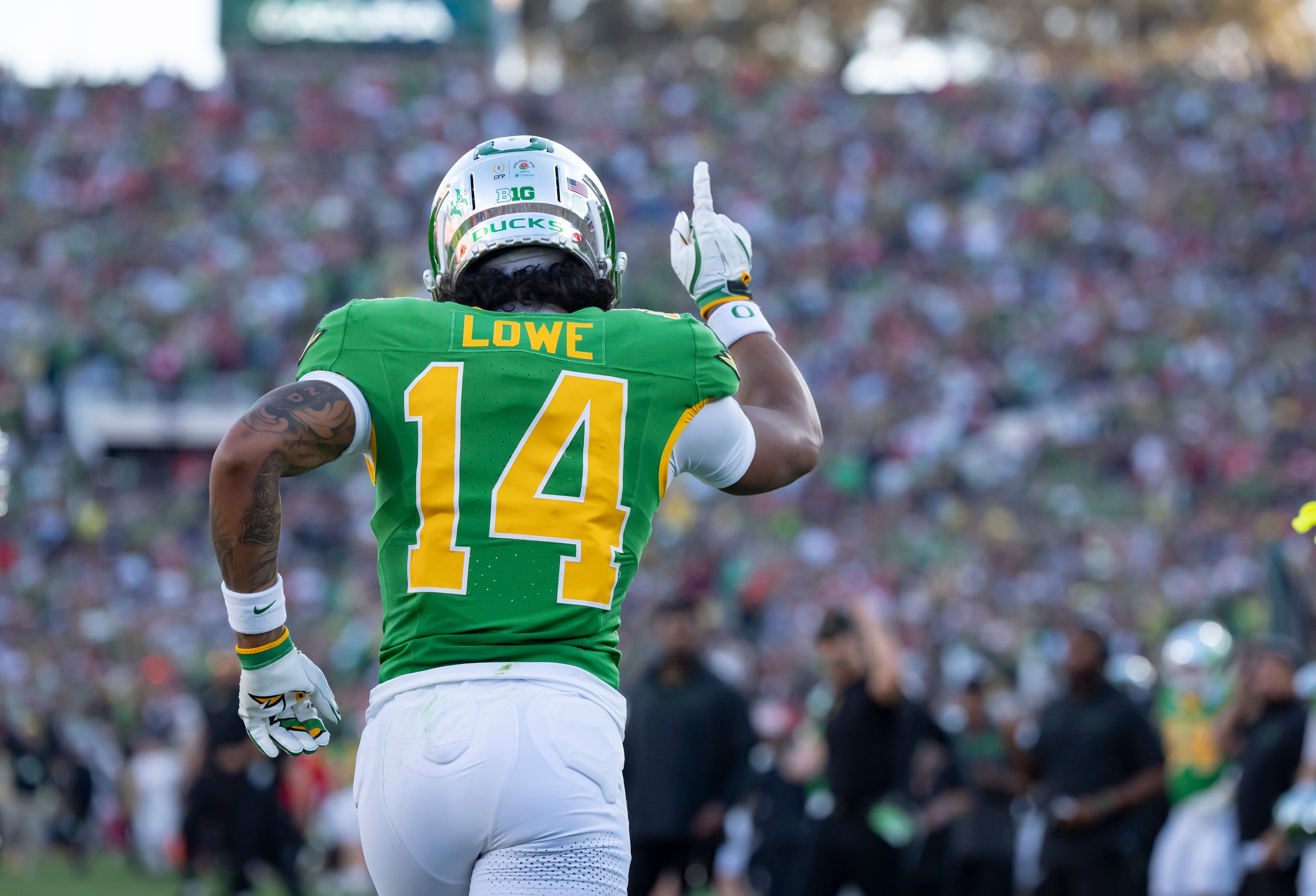 Oregon wide receiver Justius Lowe celebrates a two point conversion as the Oregon Ducks face the Ohio State Buckeyes Wednesday, Jan. 1, 2025, in the quarterfinal of the College Football Playoff at the Rose Bowl in Pasadena, Calif.