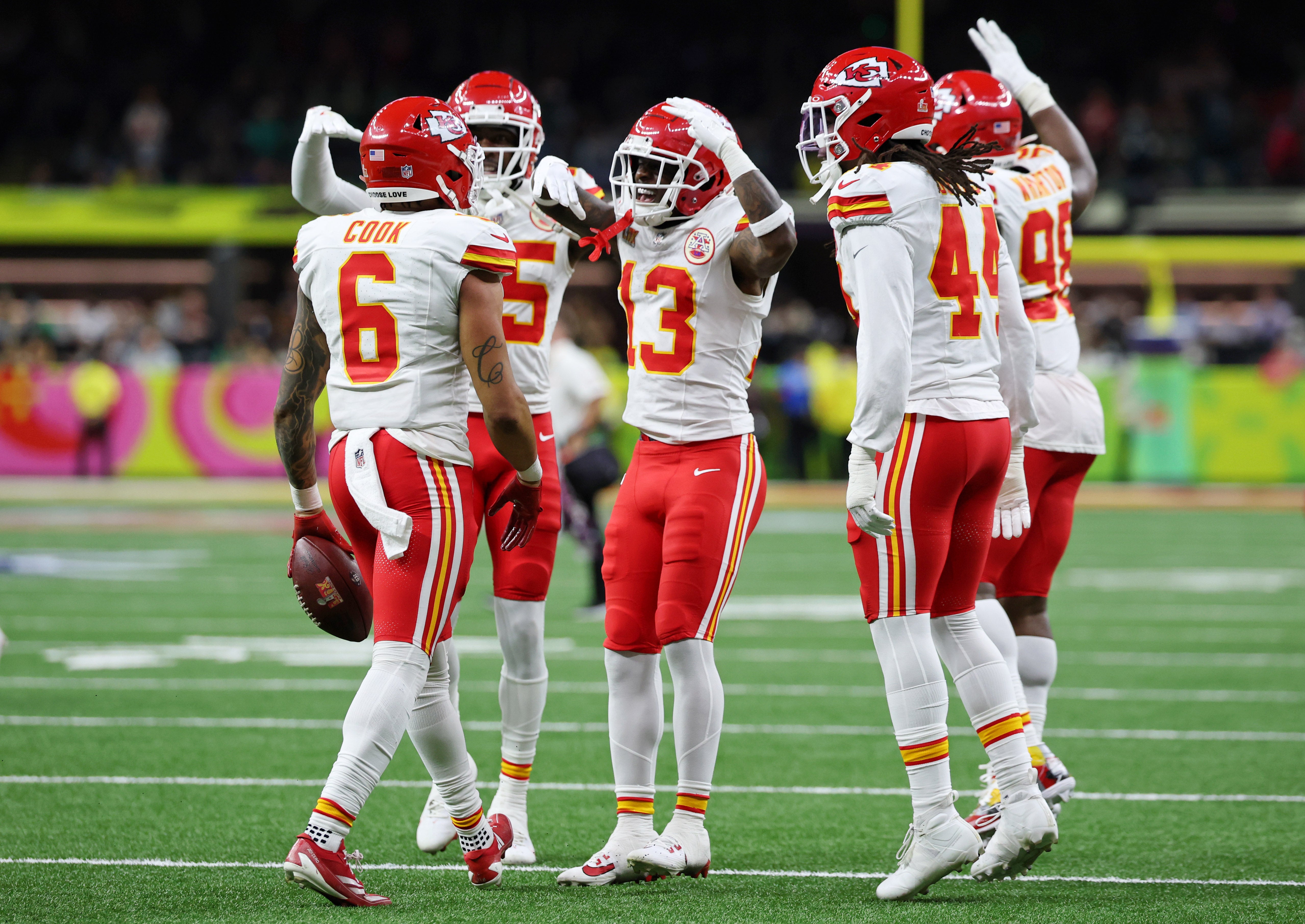 Kansas City Chiefs safety Bryan Cook (6) is congratulated by teammates after making an interception against the Philadelphia Eagles during the first half of Super Bowl LIX