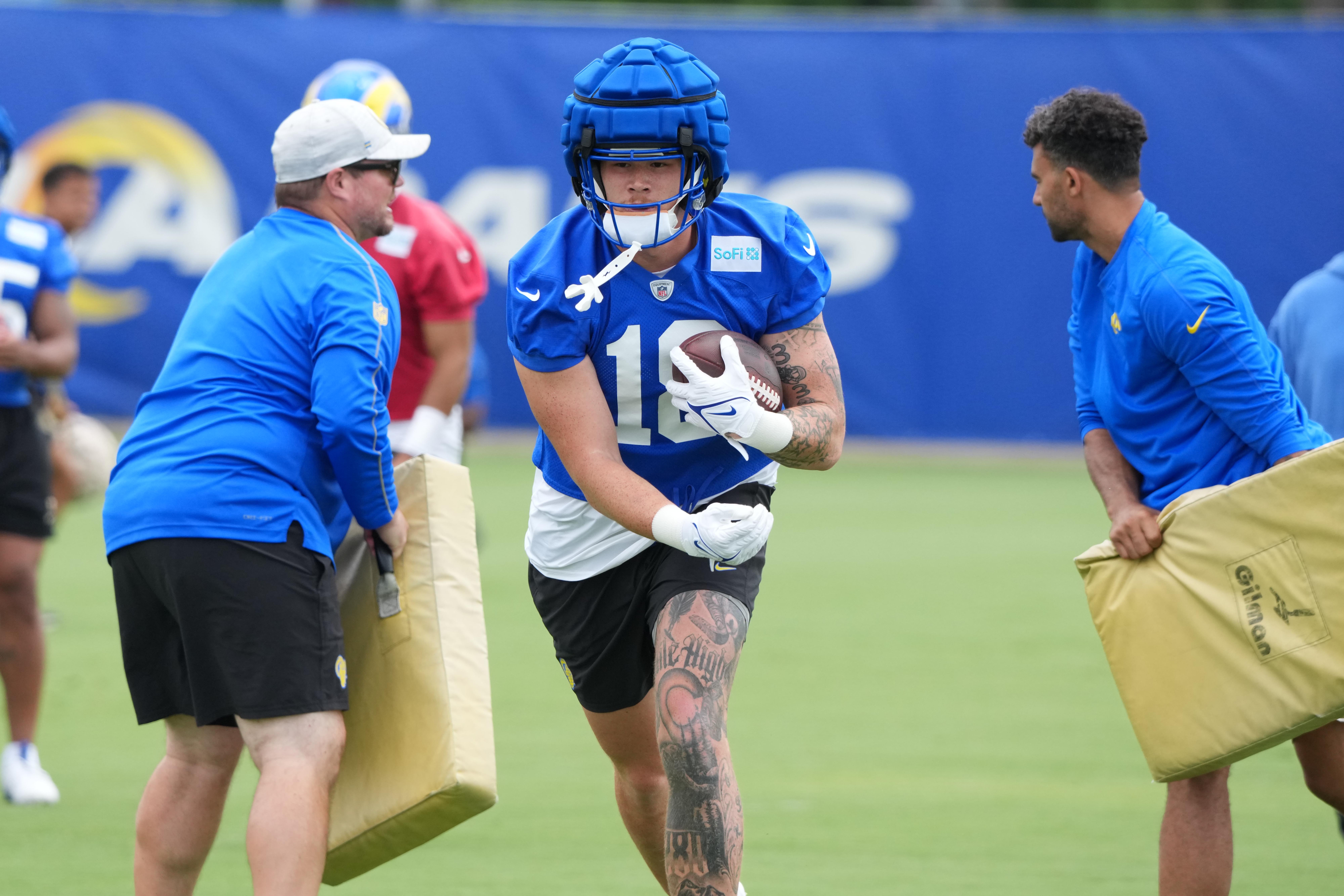 Jun 3, 2025; Woodland Hills, CA, USA; Los Angeles Rams tight end Terrance Ferguson (18) carries the ball during organized team activities at Rams Practice Facility.