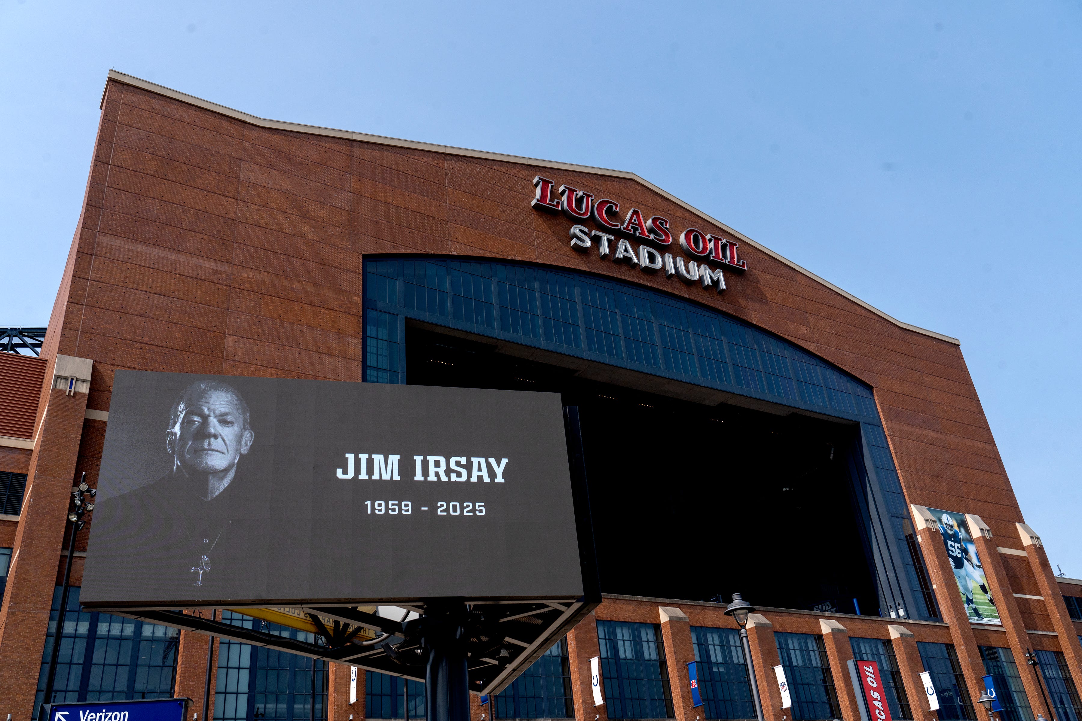 Slide honoring late Colts owner Jim Irsay shown outside of Lucas Oil Stadium