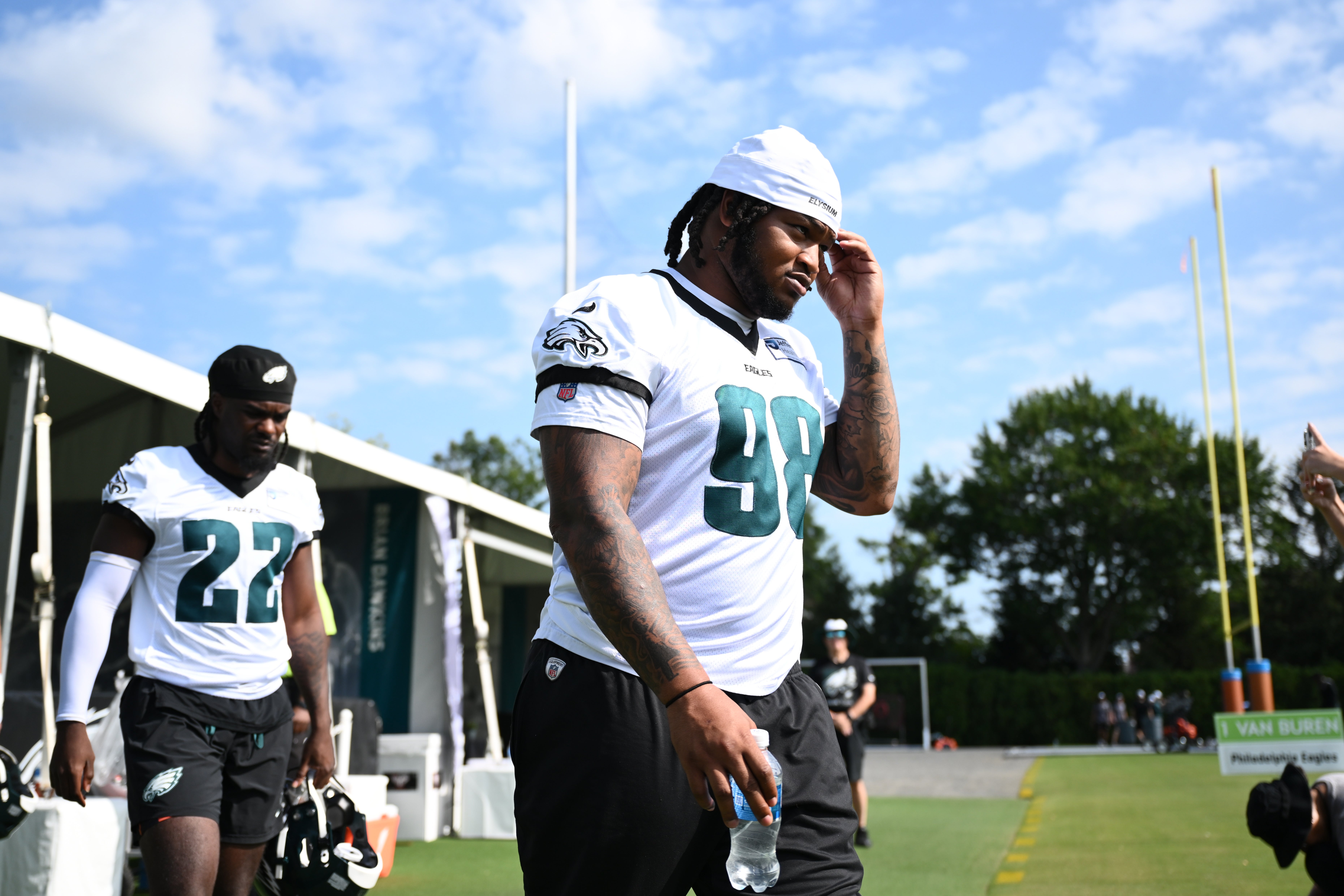 Philadelphia Eagles defensive tackle Jalen Carter (98) enters the field during training camp at NovaCare Complex.