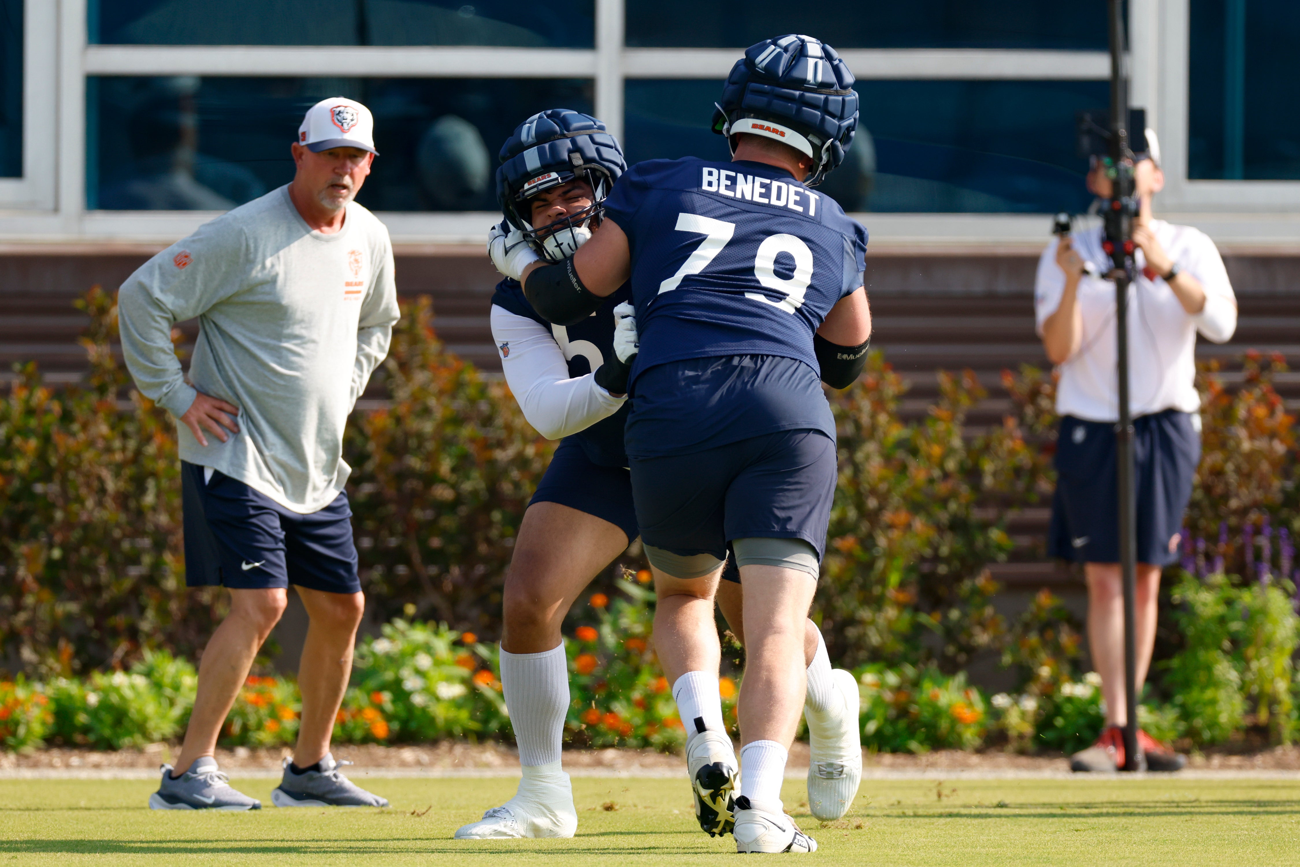 Jul 23, 2025; Lake Forest, IL, USA; Chicago Bears guard Theo Benedet (79) and offensive tackle Darnell Wright (58) run a drill during training camp at Halas Hall.