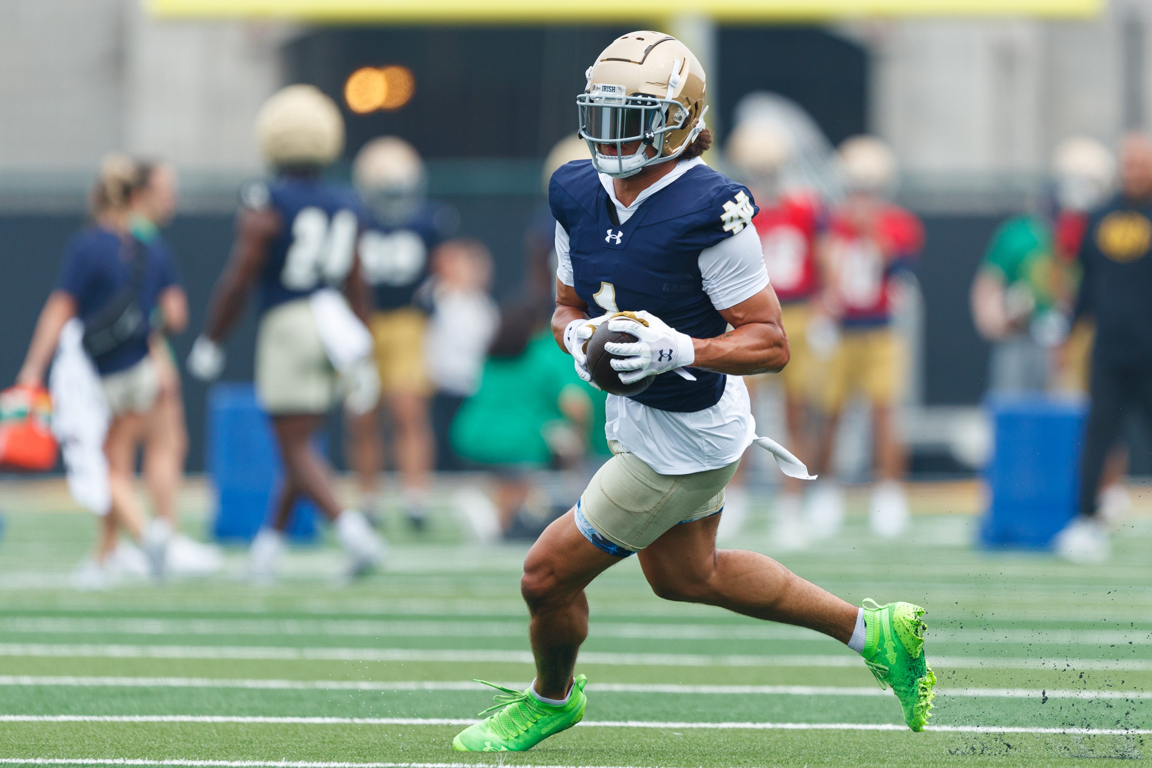 Notre Dame wide receiver Jaden Greathouse runs with the ball during a football practice at Irish Athletic Center on Thursday, July 31, 2025, in South Bend.