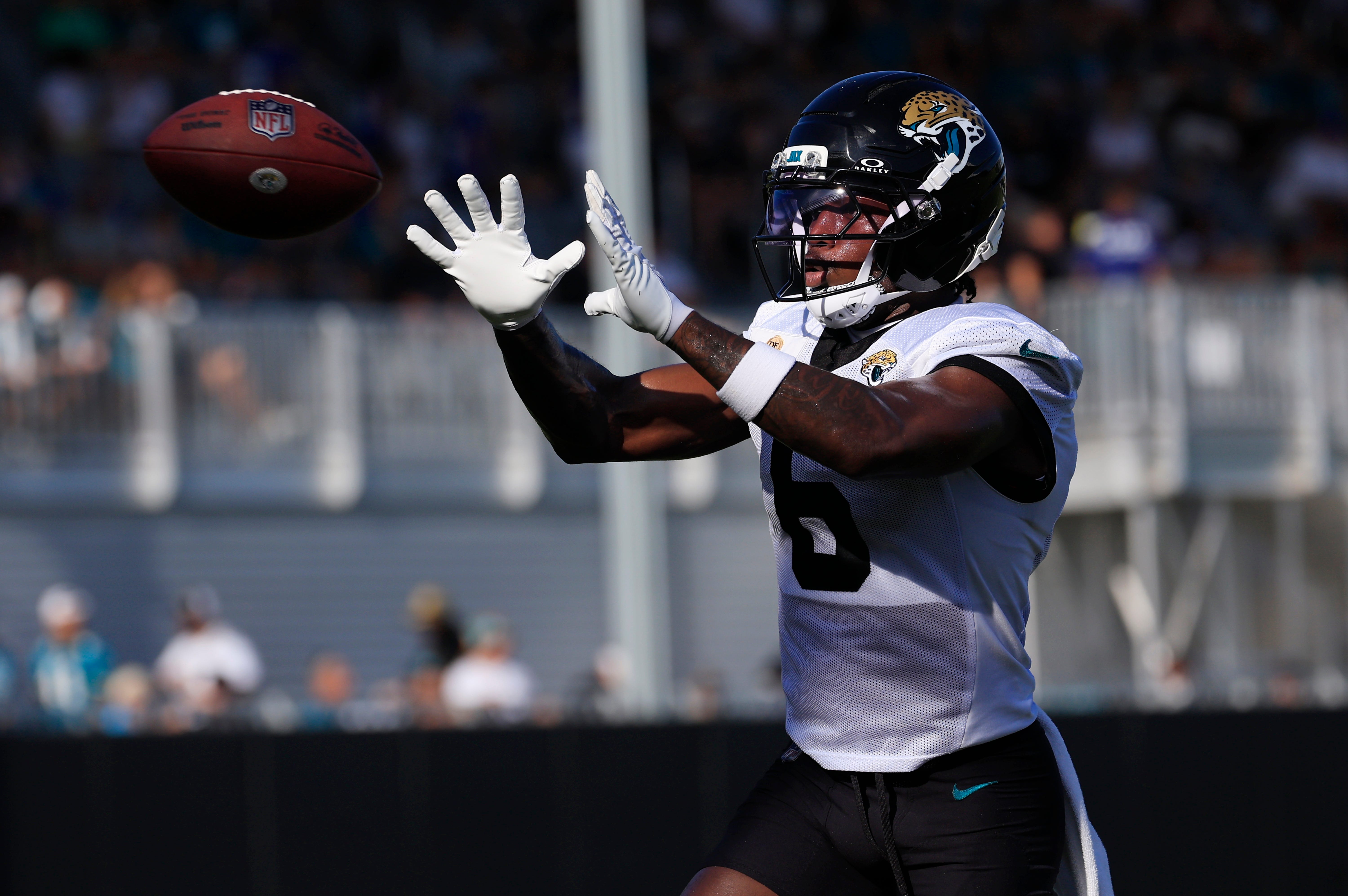 Jacksonville Jaguars safety Darnell Savage (6) catches a pass during an NFL training camp session at the Miller Electric Center, Sunday, Aug. 3, 2025, in Jacksonville, Fla.