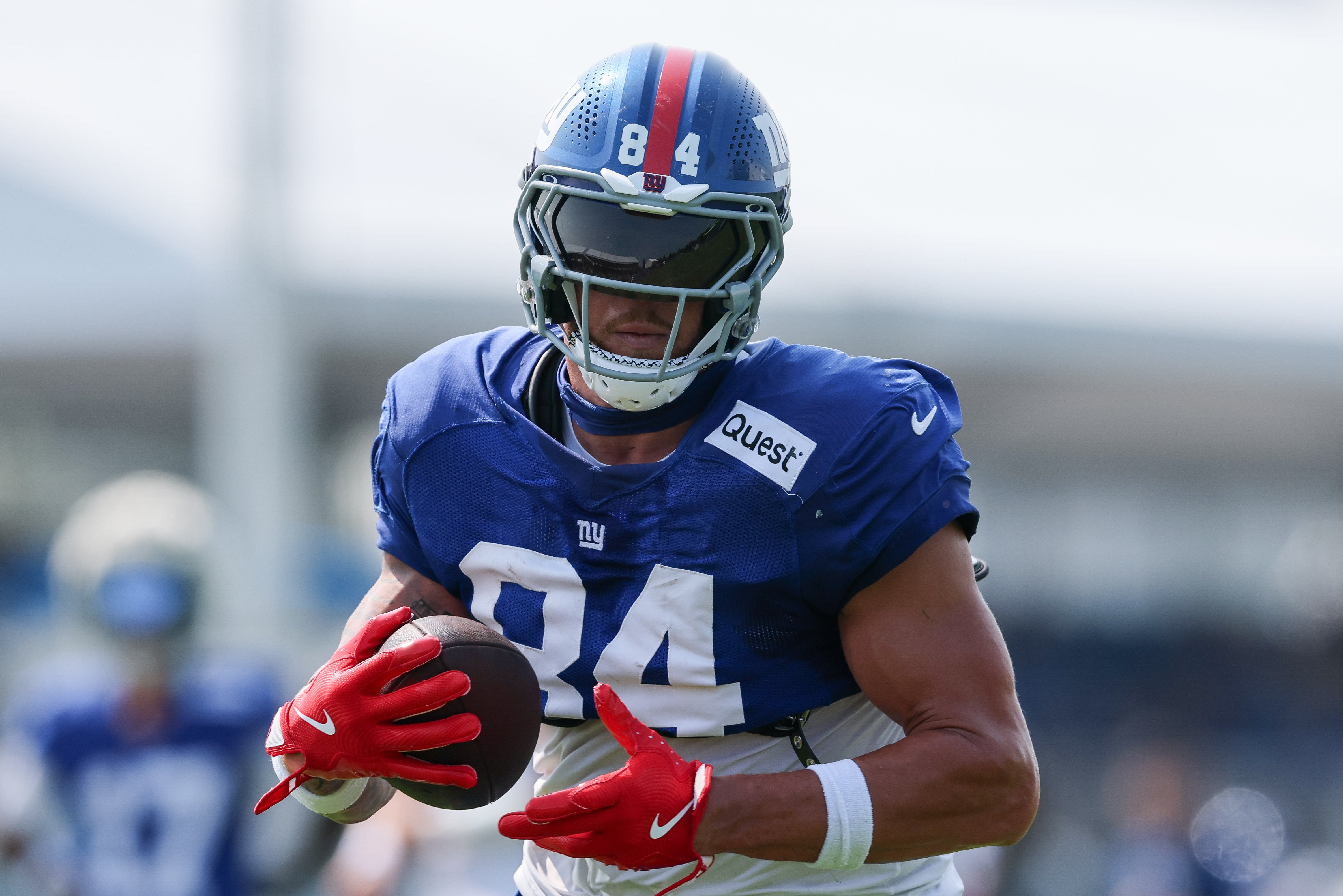 Aug 4, 2025; East Rutherford, NJ, USA; New York Giants tight end Theo Johnson (84) catches the ball during training camp at Quest Diagnostics Training Center. Mandatory