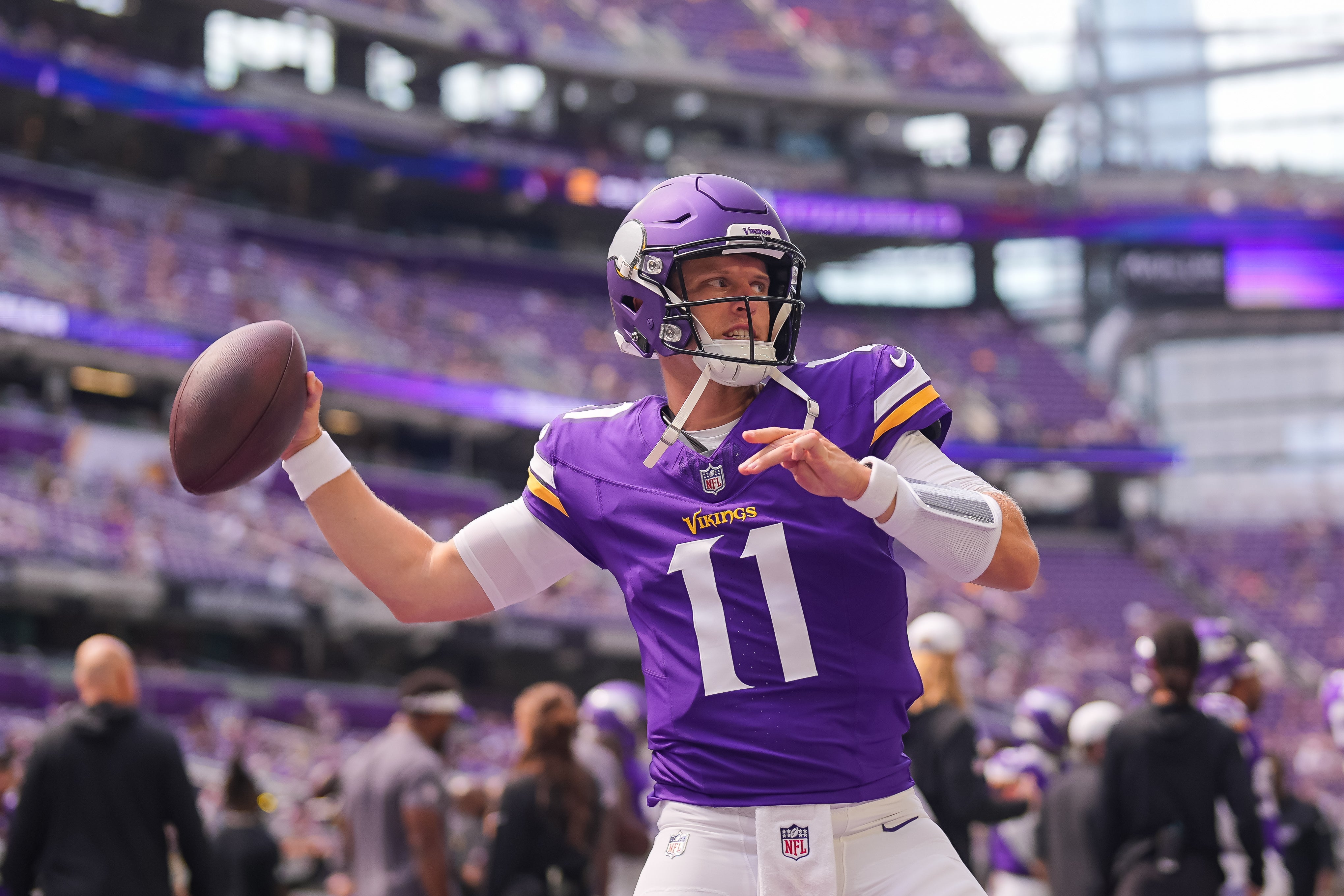 Aug 9, 2025; Minneapolis, Minnesota, USA; Minnesota Vikings quarterback Brett Rypien (11)warms up before the game against the Houston Texans at U.S. Bank Stadium.