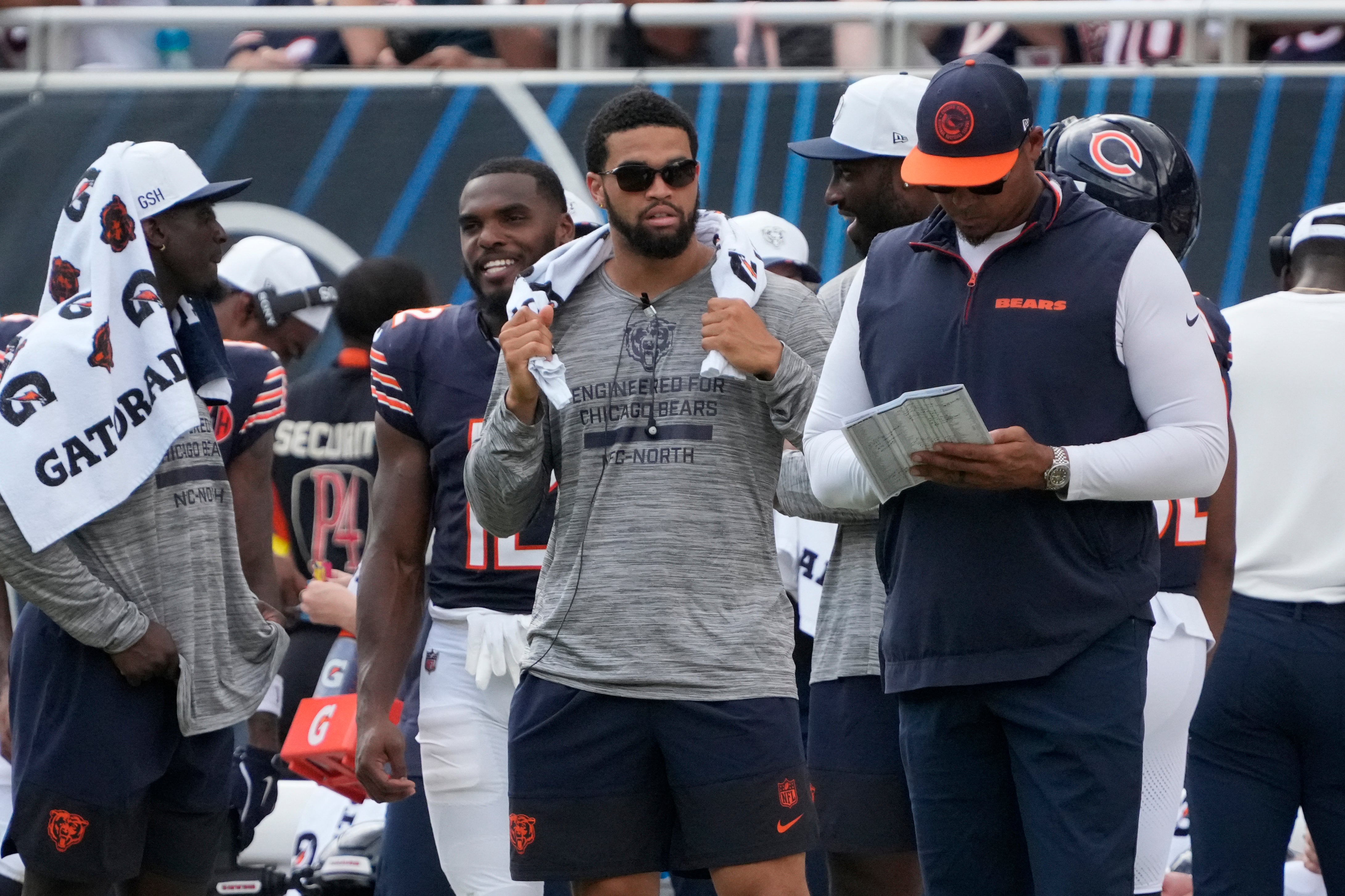 Aug 10, 2025; Chicago, Illinois, USA; Chicago Bears quarterback Caleb Williams (18) on the sidelines against the Miami Dolphins during the second half at Soldier Field.