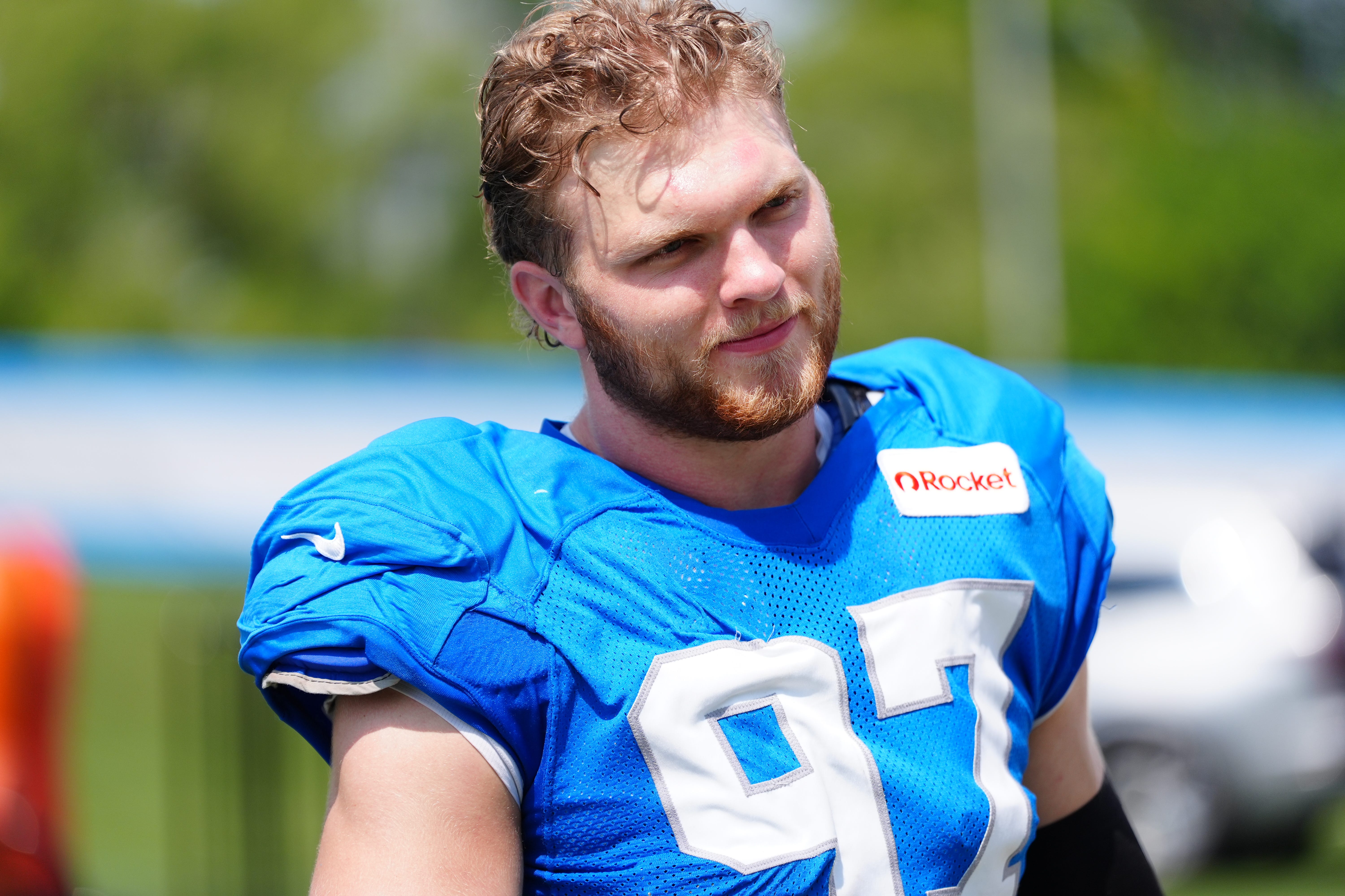Detroit Lions Edge Aidan Hutchinson walks off the field during the joint practice with the Miami Dolphins at the Lions headquarters and training facility in Allen Park, Thursday, Aug. 14 2025