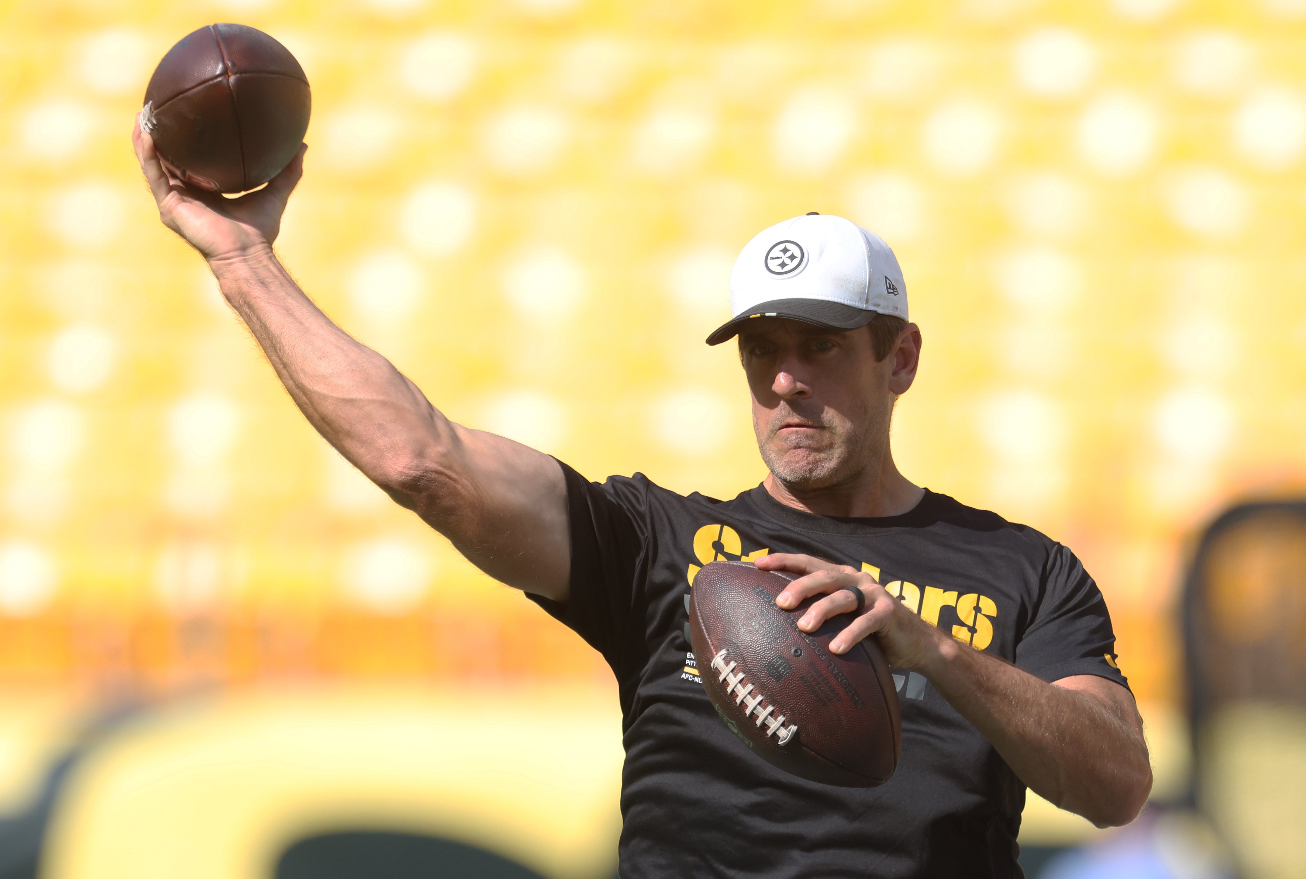 Aug 16, 2025; Pittsburgh, Pennsylvania, USA; Pittsburgh Steelers quarterback Aaron Rodgers (8) warms up before the game against the Tampa Bay Buccaneers at Acrisure Stadium.