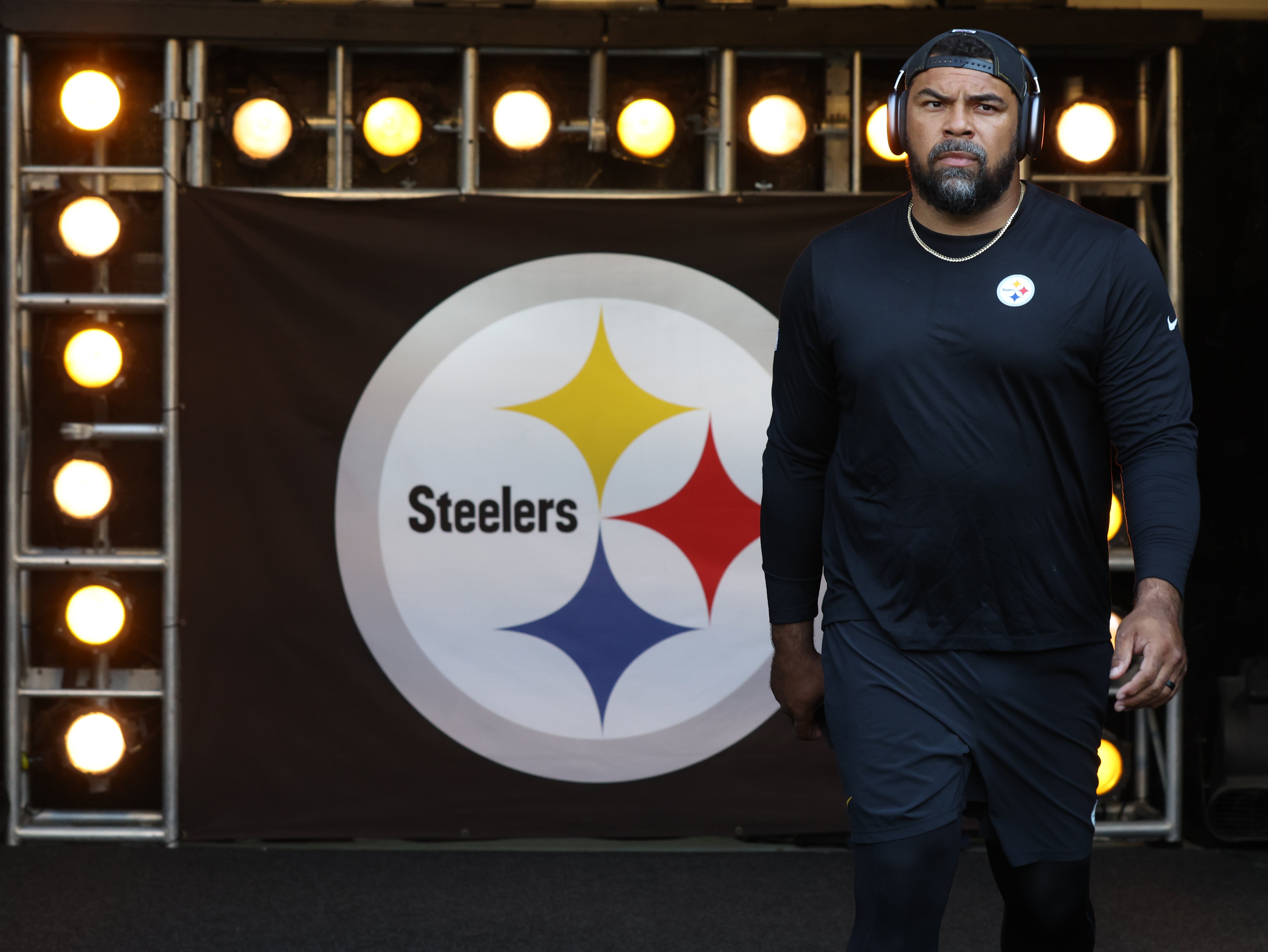 Aug 16, 2025; Pittsburgh, Pennsylvania, USA; Pittsburgh Steelers defensive tackle Cameron Heyward (97) takes the field to warm up before the game against the Tampa Bay Buccaneers at Acrisure Stadium.