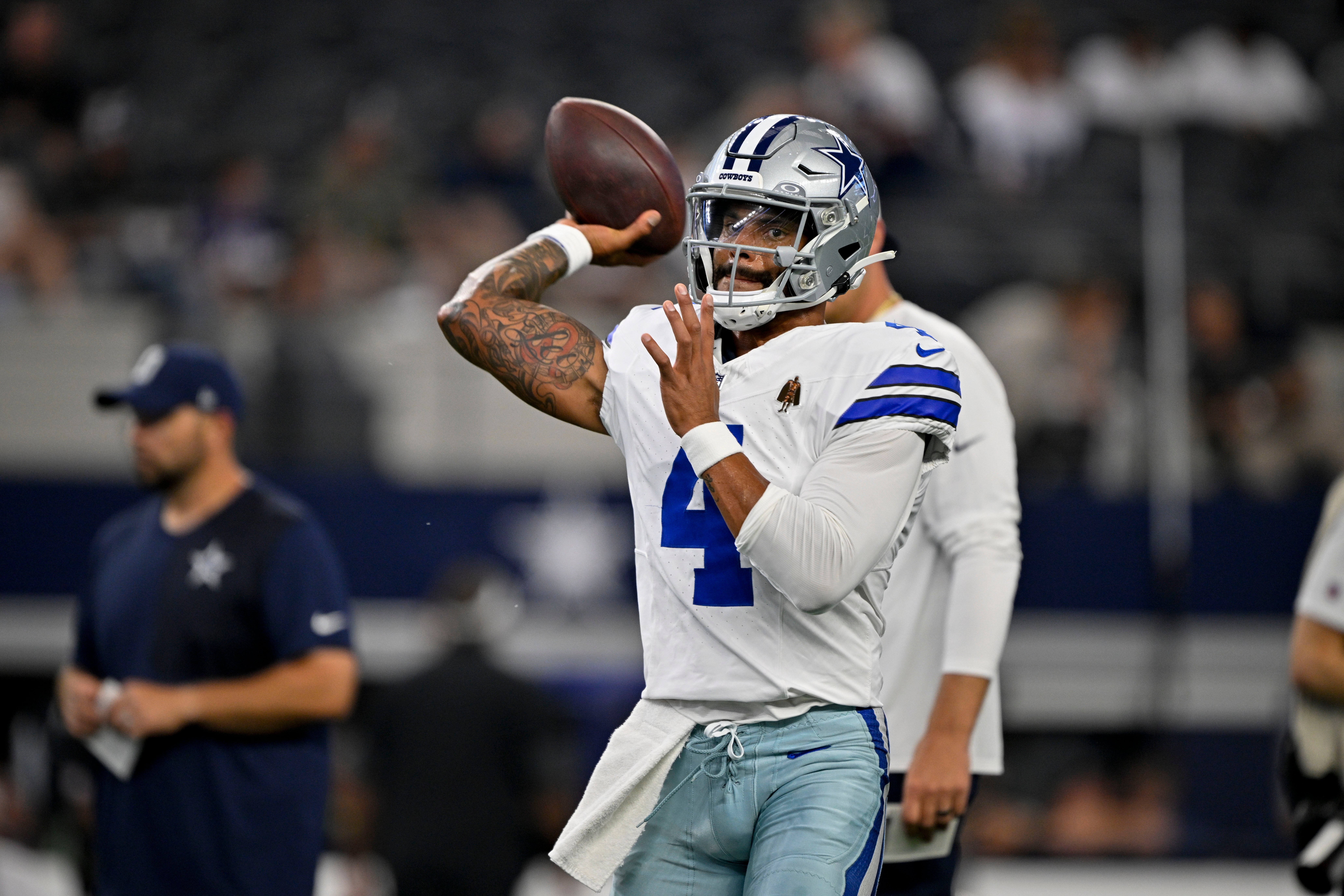 Dallas Cowboys quarterback Dak Prescott (4) warms up before the game at against the Baltimore Ravens AT&T Stadium.