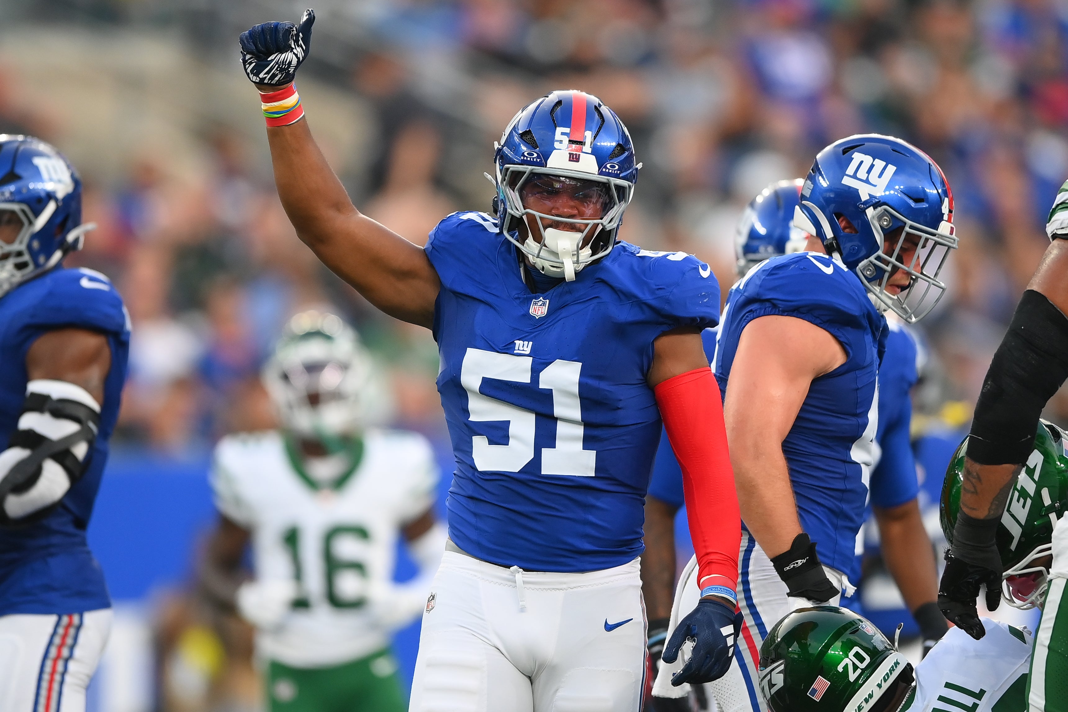 Aug 16, 2025; East Rutherford, New Jersey, USA; New York Giants linebacker Abdul Carter (51) reacts to a play against the New York Jets during the first half at MetLife Stadium.