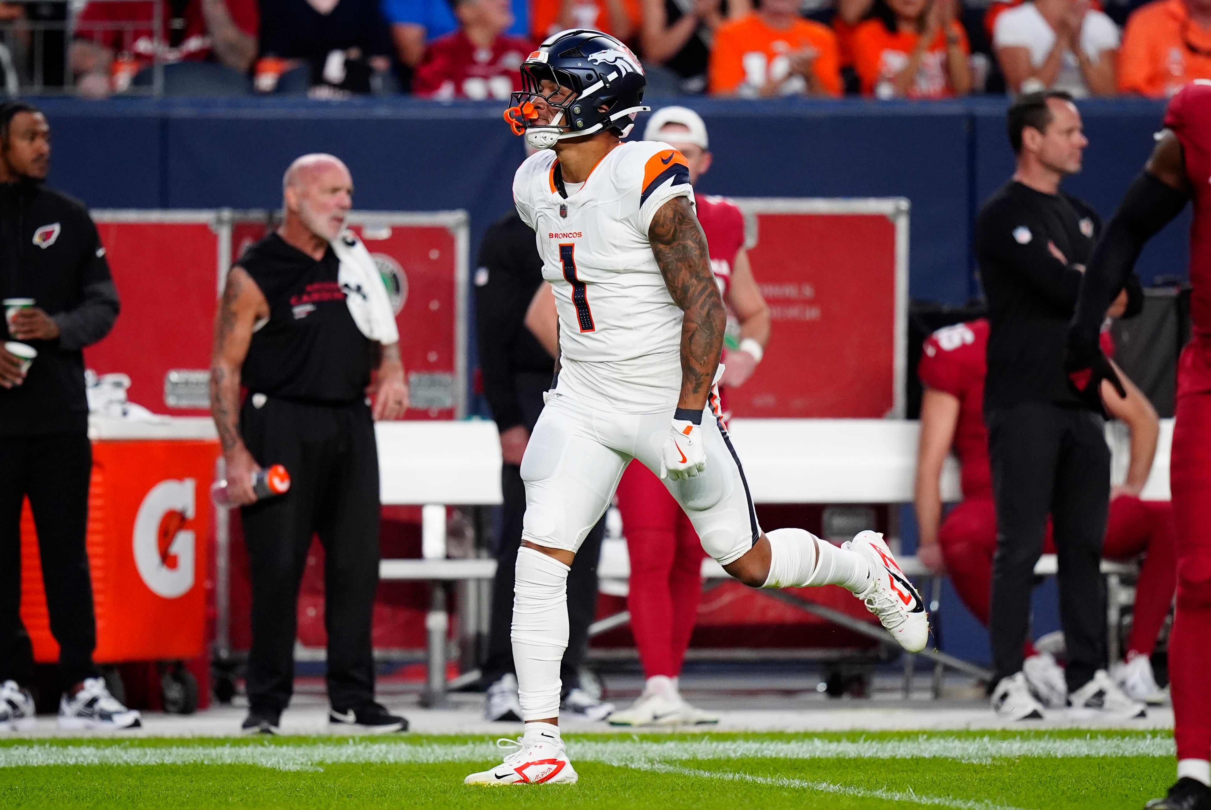 Aug 16, 2025; Denver, Colorado, USA; Denver Broncos tight end Evan Engram (1) following a reception in the first quarter against the Arizona Cardinals at Empower Field at Mile High.