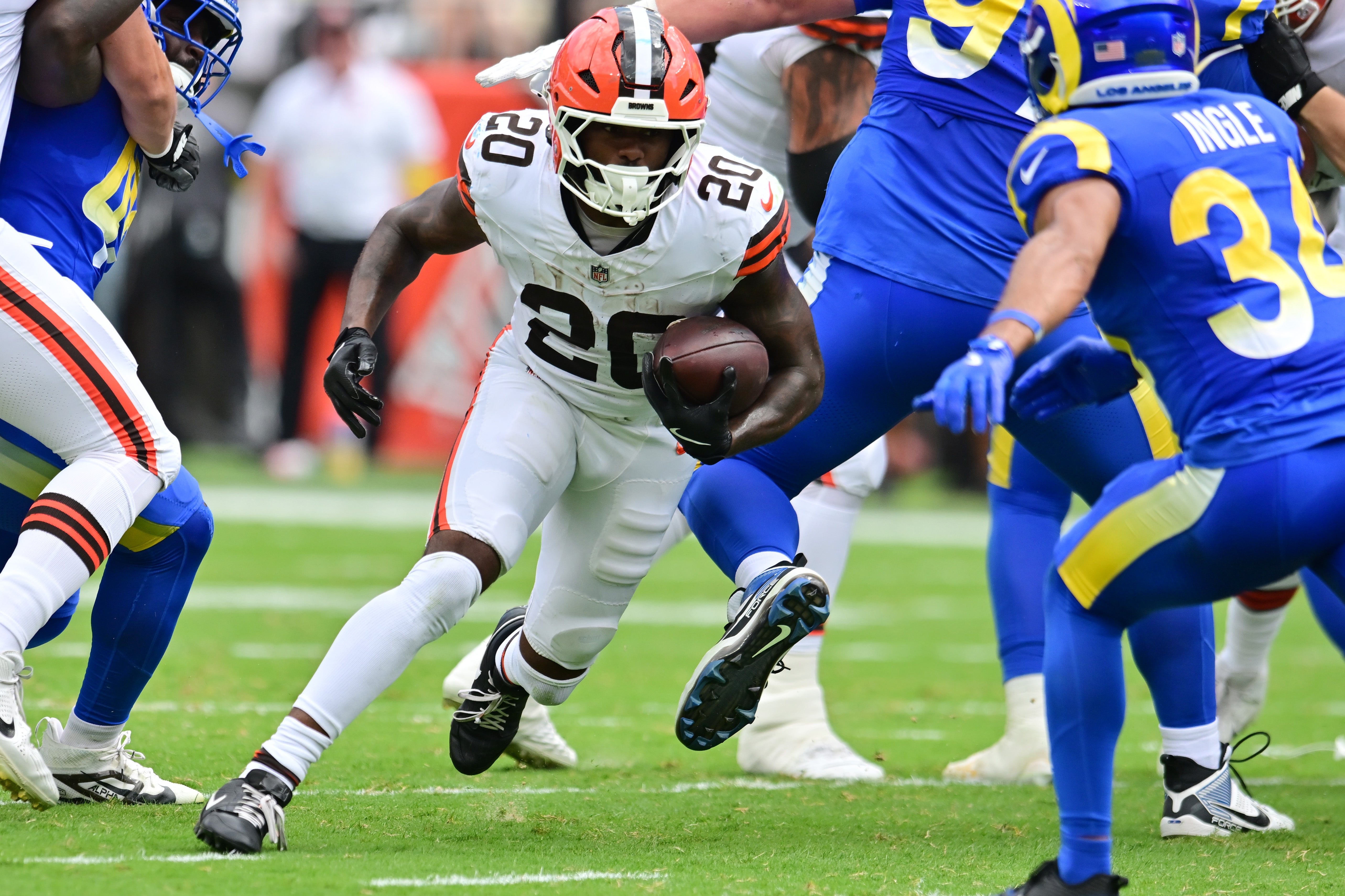 Aug 23, 2025; Cleveland, Ohio, USA; Cleveland Browns running back Pierre Strong Jr. (20) runs with the ball during the first half against the Los Angeles Rams at Huntington Bank Field.
