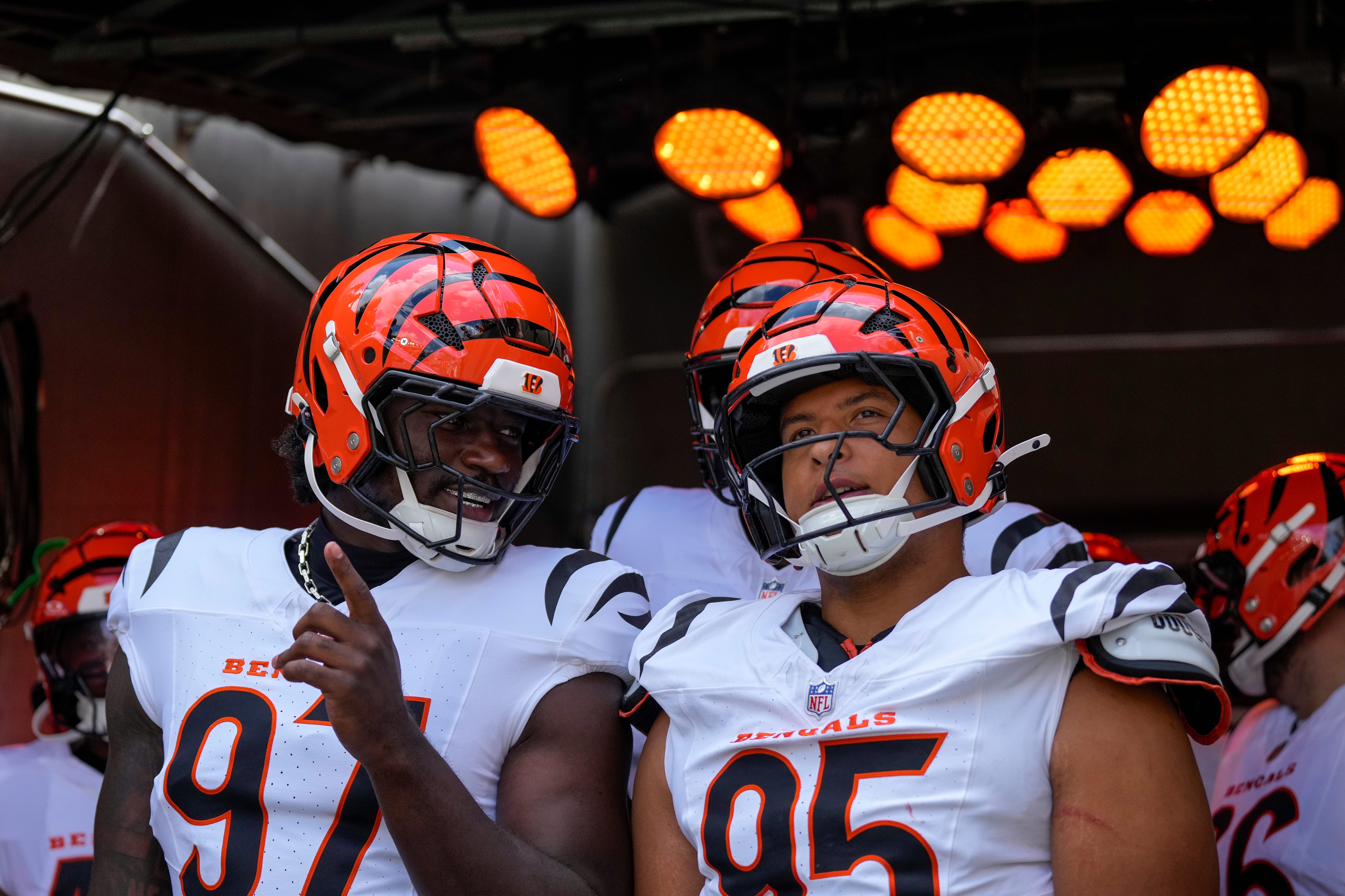 Cincinnati Bengals defensive end Shemar Stewart (97) and defensive tackle Howard Cross III (95) prepare to take the field for the first quarter of the NFL Preseason Week 3 game between the Cincinnati Bengals and the Indianapolis Colts at Paycor Stadium in Cincinnati on Saturday, Aug. 23, 2025. The Colts led 24-7 at halftime.