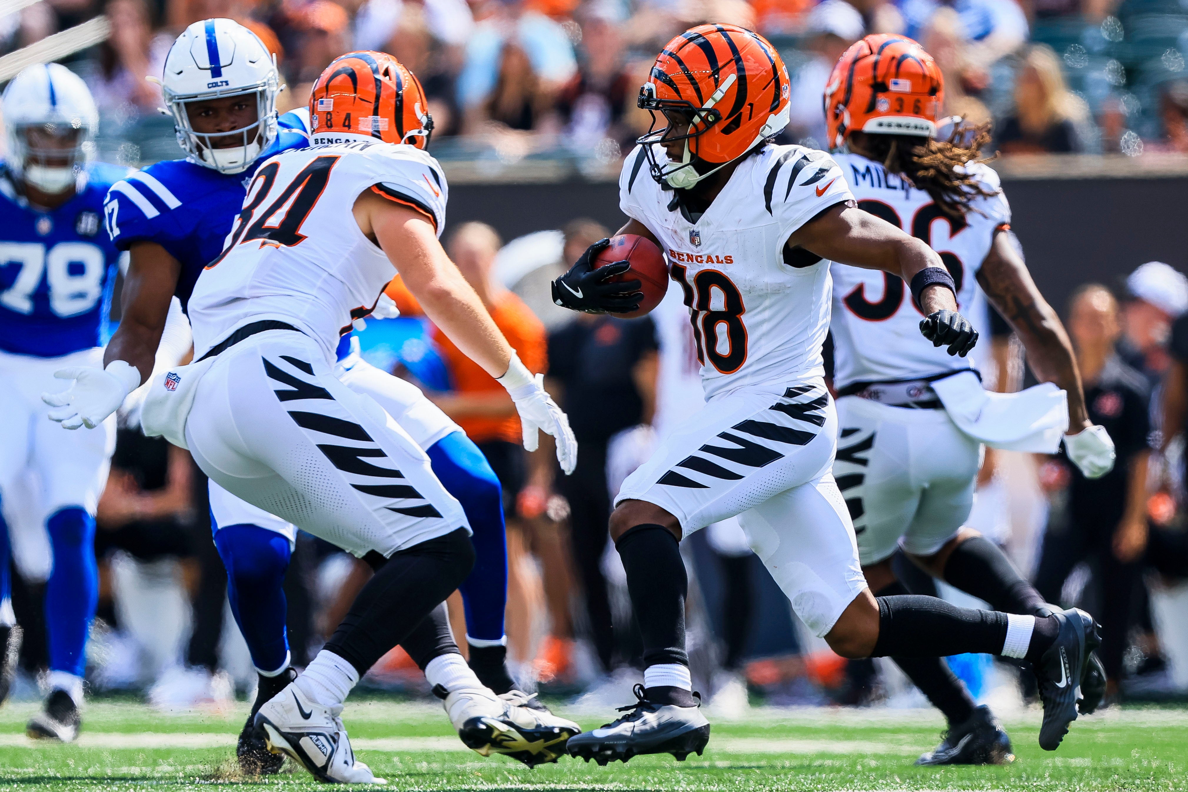 Aug 23, 2025; Cincinnati, Ohio, USA; Cincinnati Bengals wide receiver Isaiah Williams (18) runs with the ball against the Indianapolis Colts in the second half at Paycor Stadium.