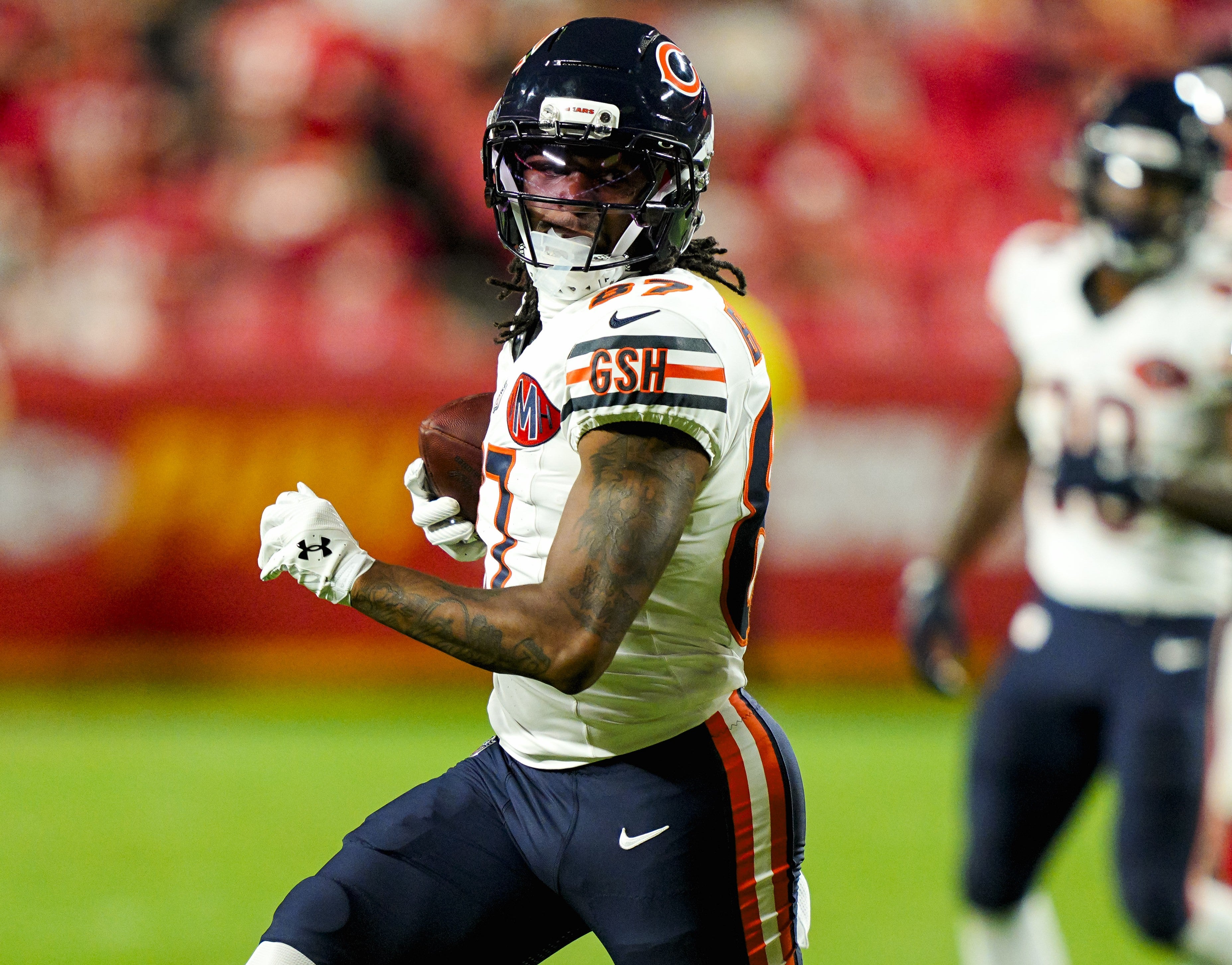 Aug 22, 2025; Kansas City, Missouri, USA; Chicago Bears wide receiver Luther Burden III (87) runs with the ball during the first half against the Kansas City Chiefs at GEHA Field at Arrowhead Stadium.
