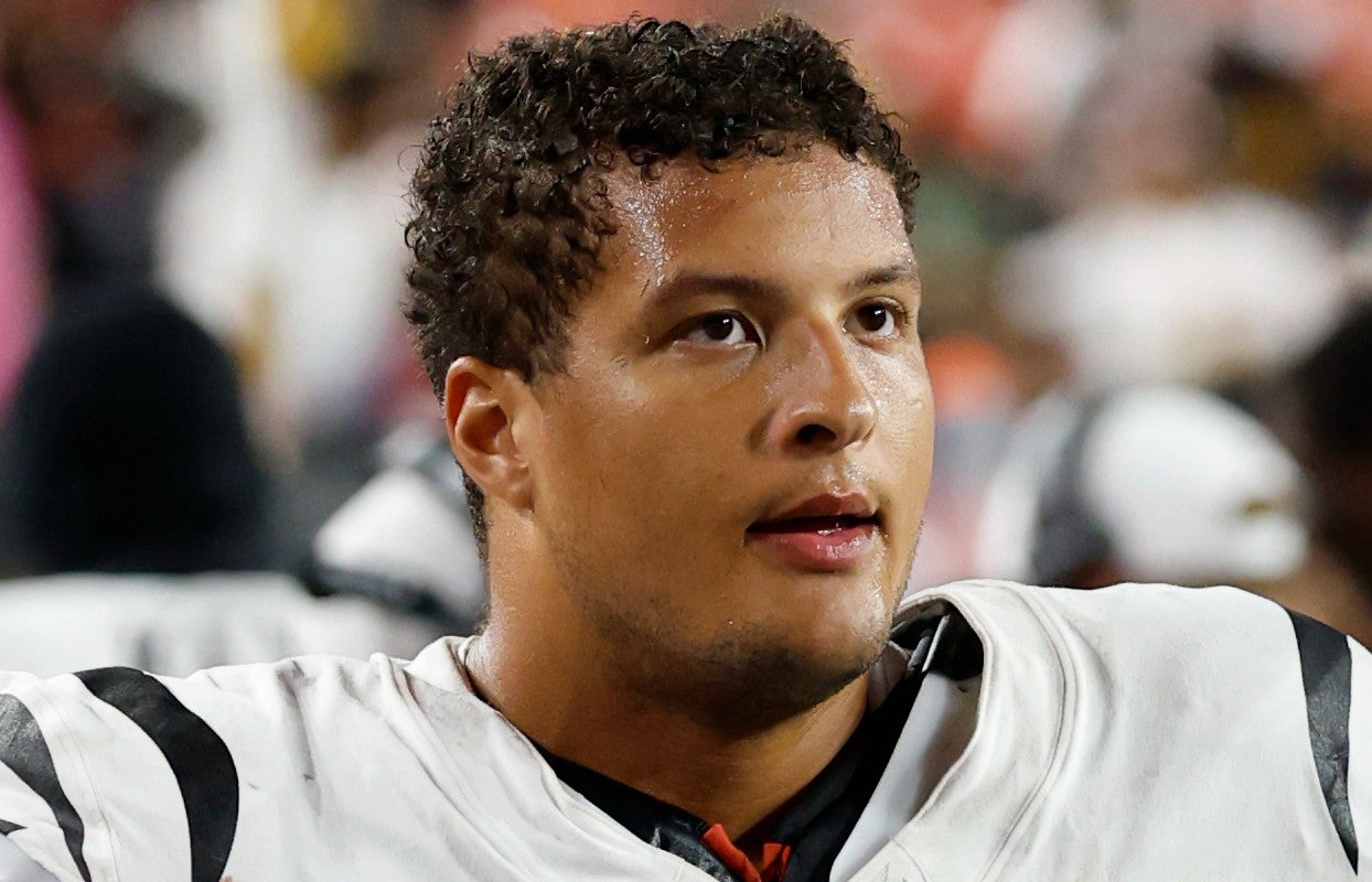 Aug 18, 2025; Landover, Maryland, USA; Cincinnati Bengals defensive tackle Howard Cross III (95) stands on the sidelines against the Washington Commanders at Northwest Stadium.