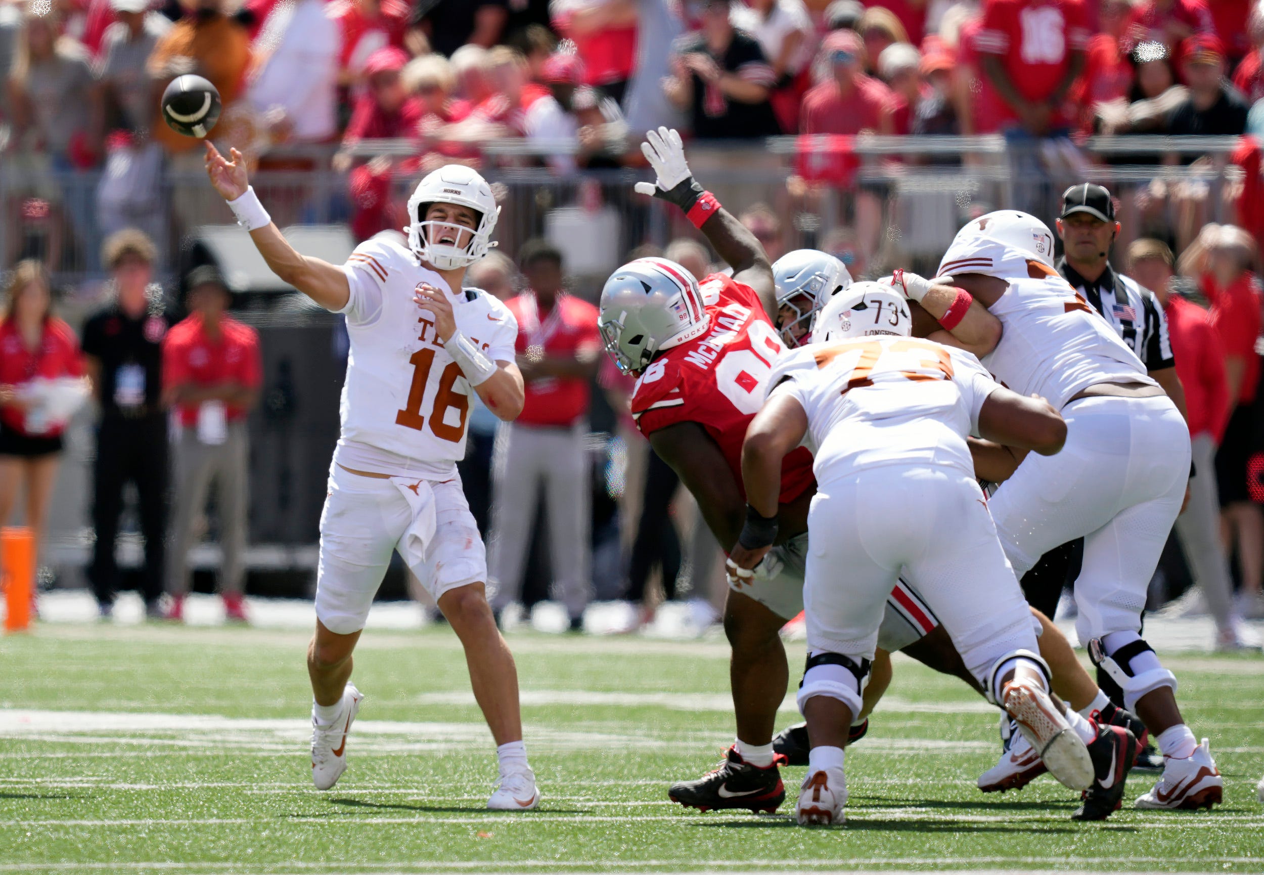 Texas Longhorns quarterback Arch Manning (16) throws an interception to Ohio State Buckeyes cornerback Jermaine Mathews Jr. (7) in the third quarter of their game at Ohio Stadium in Columbus, Ohio on Aug 30, 2025.