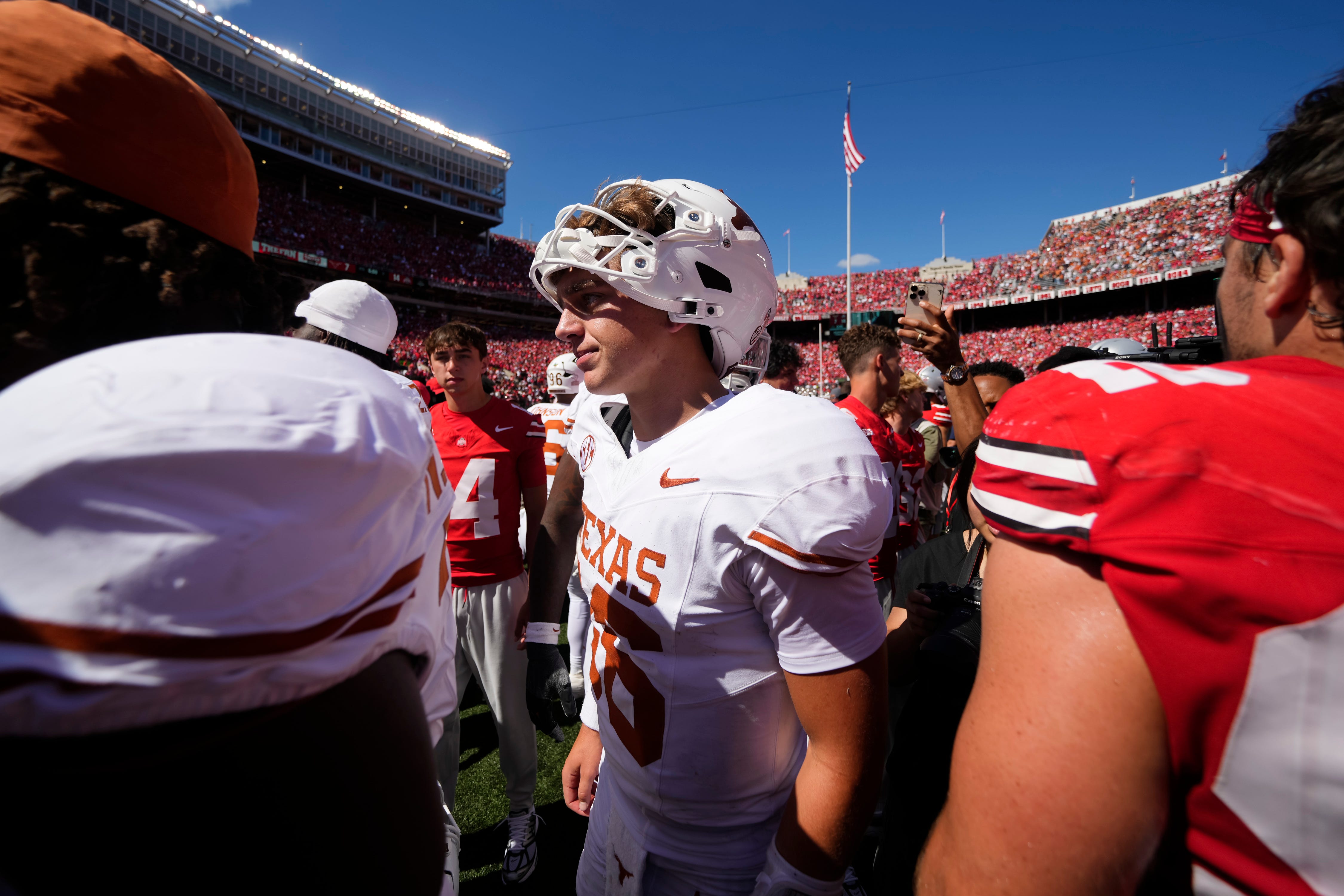 Texas Longhorns quarterback Arch Manning (16) leaves the field following the NCAA football game against the Ohio State Buckeyes at Ohio Stadium on Aug. 30, 2025. Ohio State won 14-7.