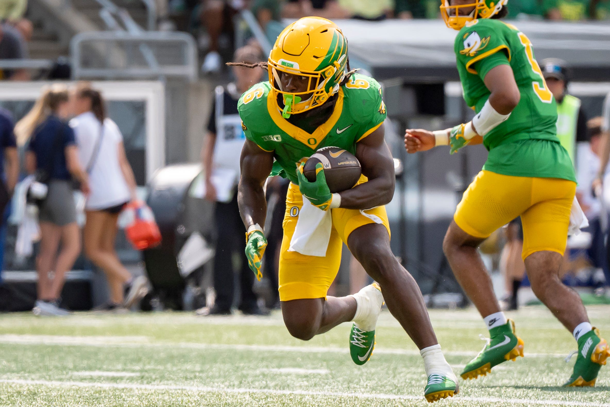 Oregon running back Noah Whittington carries the ball as the Oregon Ducks host the Montana State Bobcats on Aug. 30, 2025, at Autzen Stadium in Eugene, Oregon.
