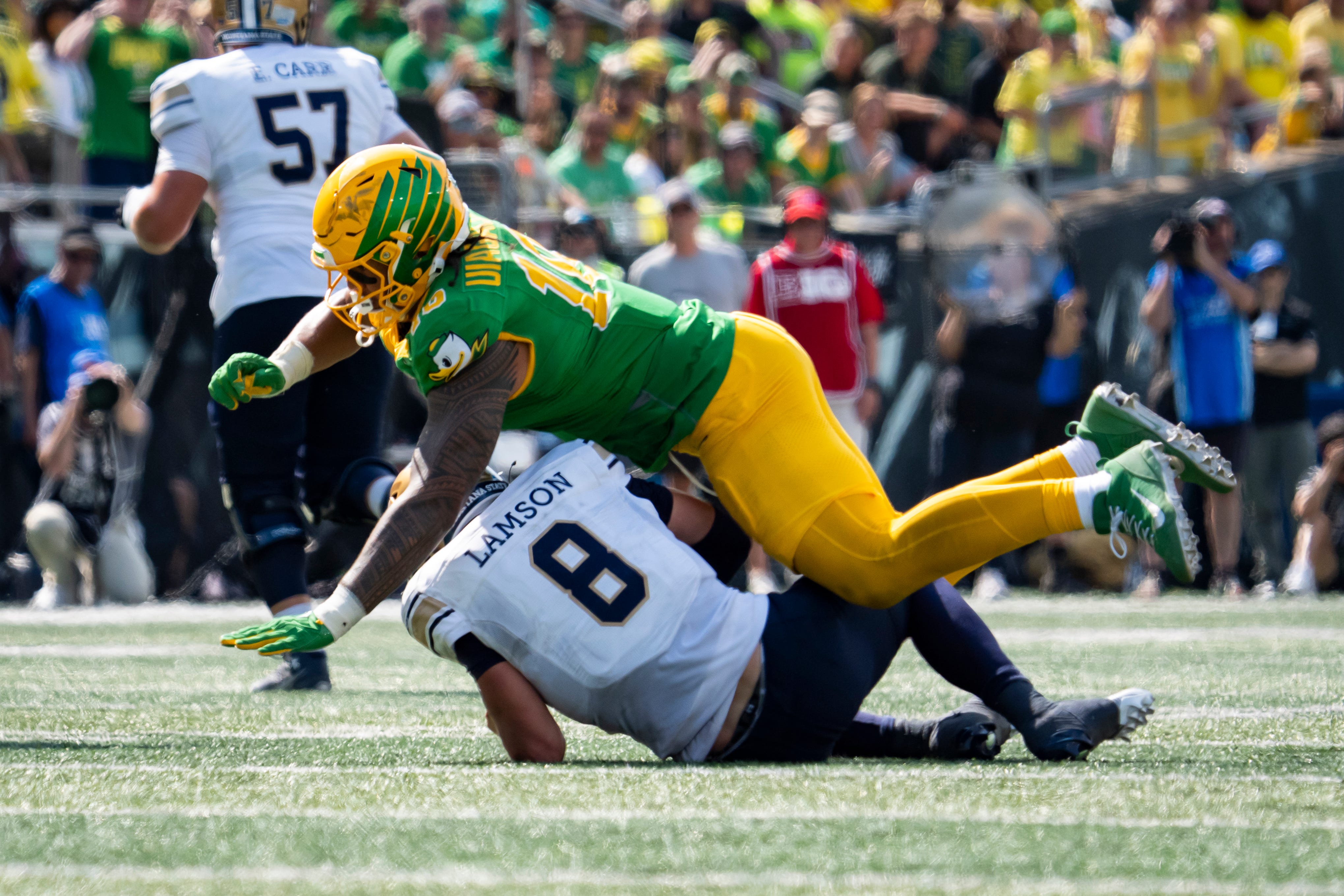 Oregon outside linebacker Matayo Uiagalelei sacks Montana State quarterback Justin Lamson as the Oregon Ducks host the Montana State Bobcats on Aug. 30, 2025, at Autzen Stadium in Eugene, Oregon.