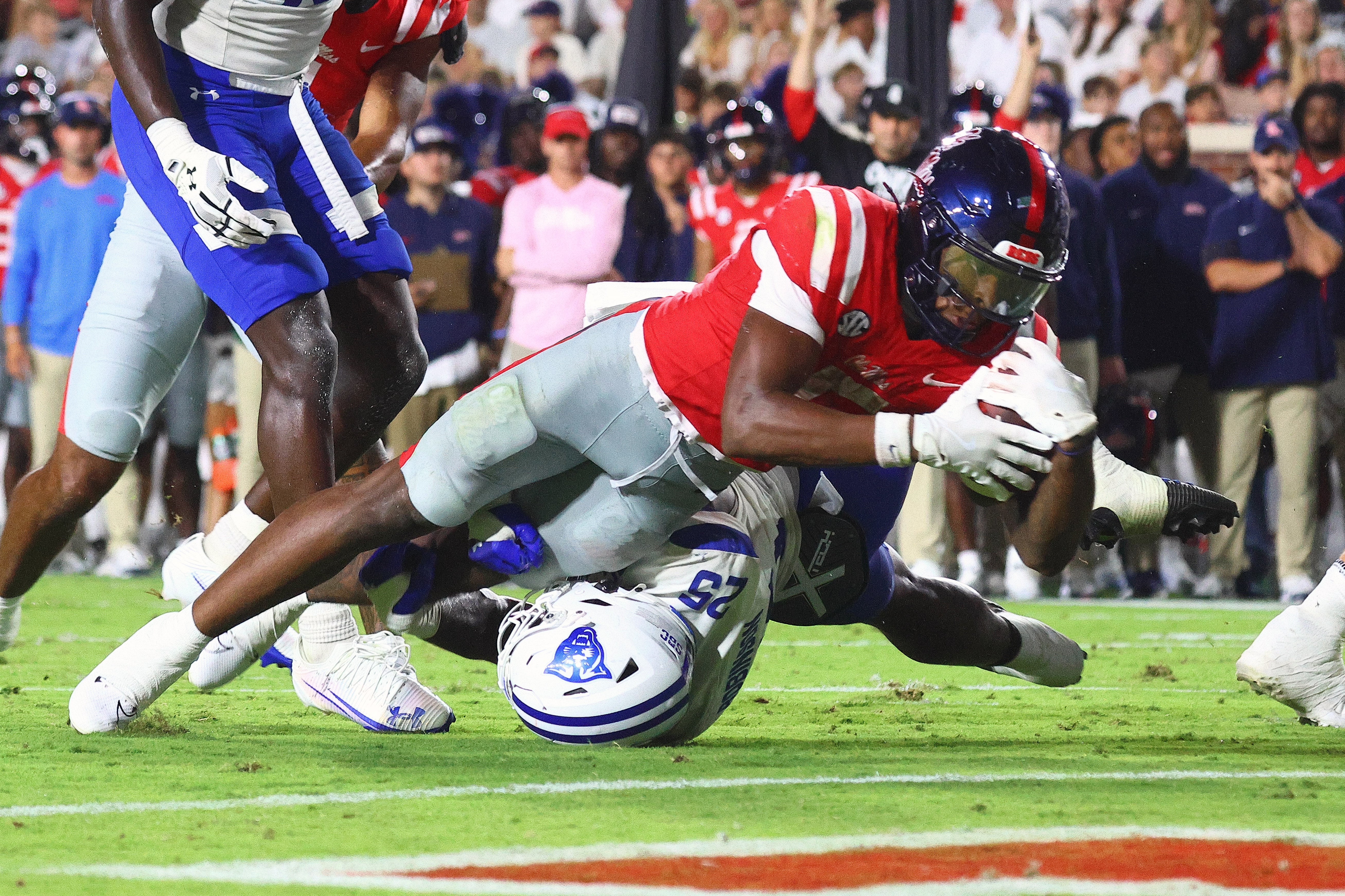 Aug 30, 2025; Oxford, Mississippi, USA; Mississippi Rebels running back Kewan Lacy (5) dives for a touchdown during the second quarter against the Georgia State Panthers at Vaught-Hemingway Stadium.