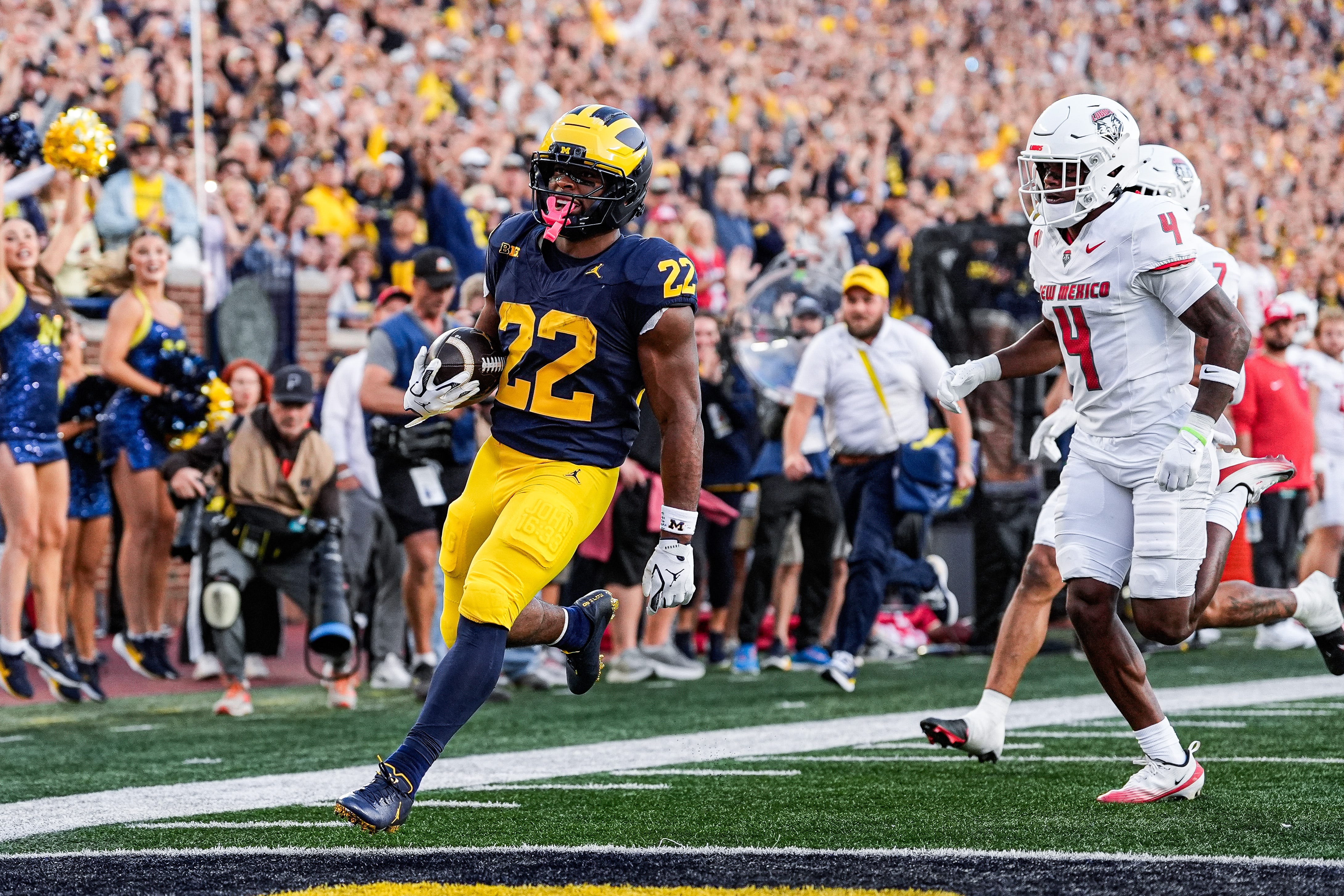 Michigan running back Justice Haynes (22) runs for a touchdown against New Mexico during the first half at Michigan Stadium in Ann Arbor on Saturday, August 30, 2025.