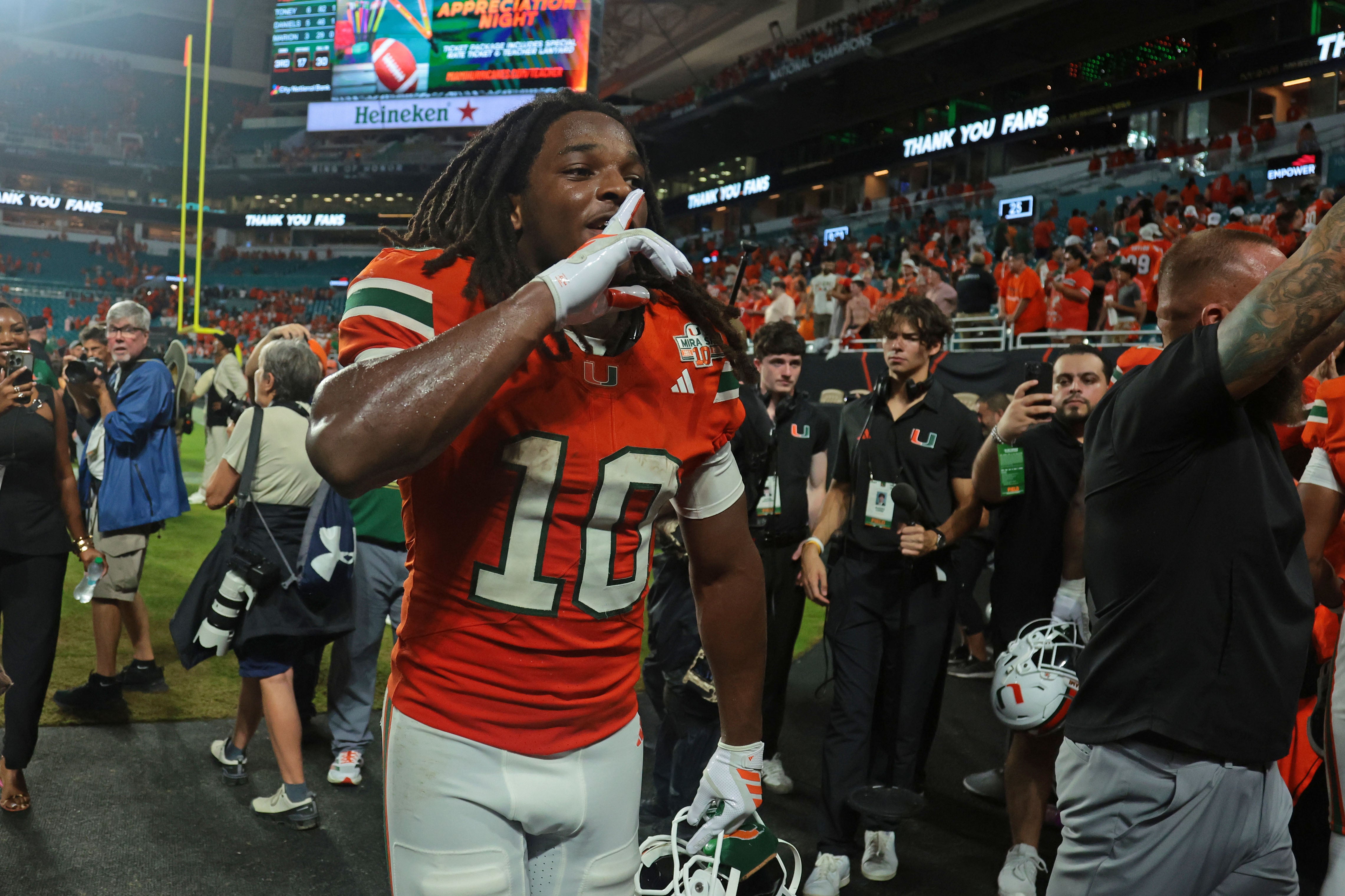 Aug 31, 2025; Miami Gardens, Florida, USA; Miami Hurricanes wide receiver Malachi Toney (10) reacts after defeating the Notre Dame Fighting Irish at Hard Rock Stadium.