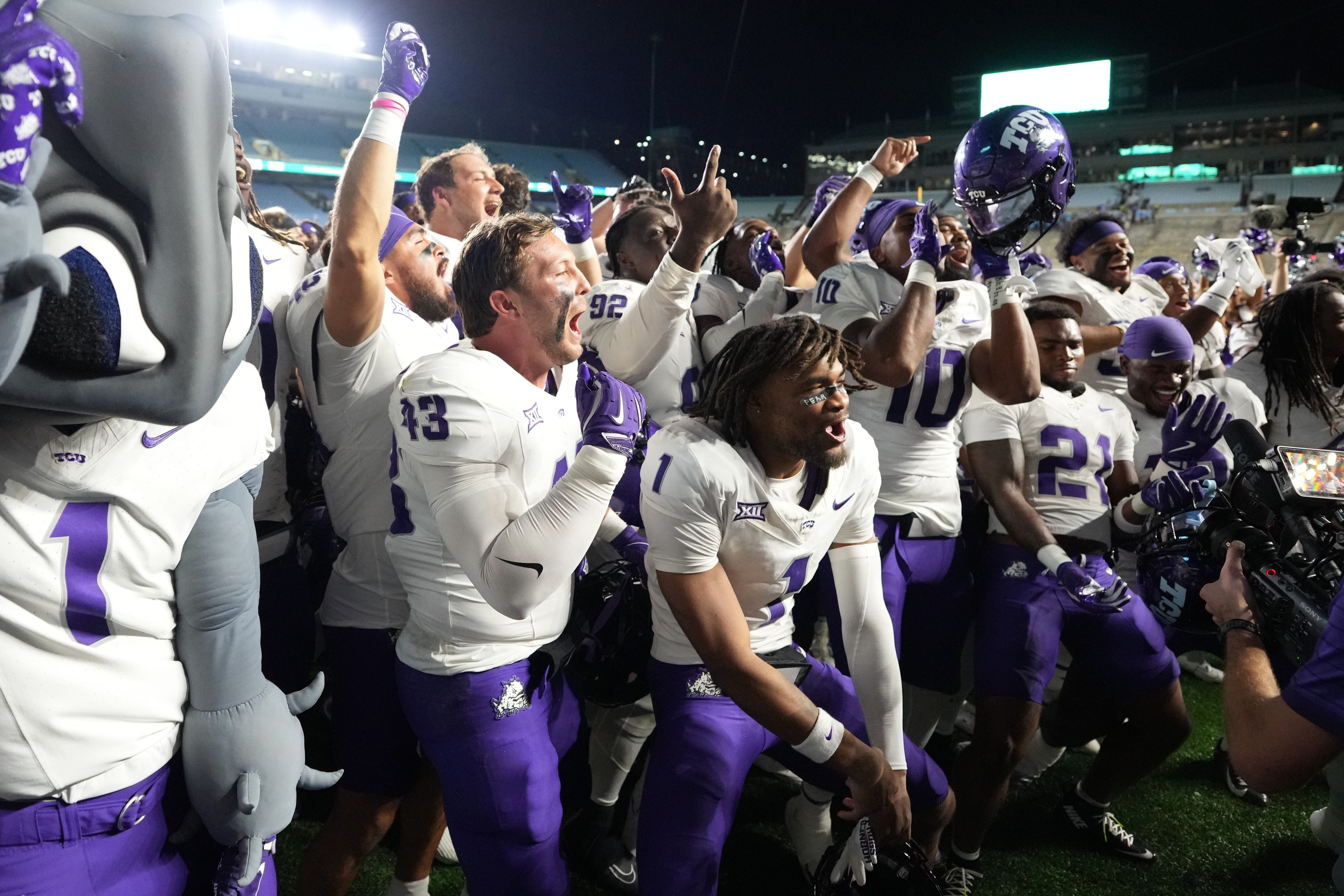 Sep 1, 2025; Chapel Hill, North Carolina, USA; TCU Horned Frogs players celebrate after the game at Kenan Stadium.