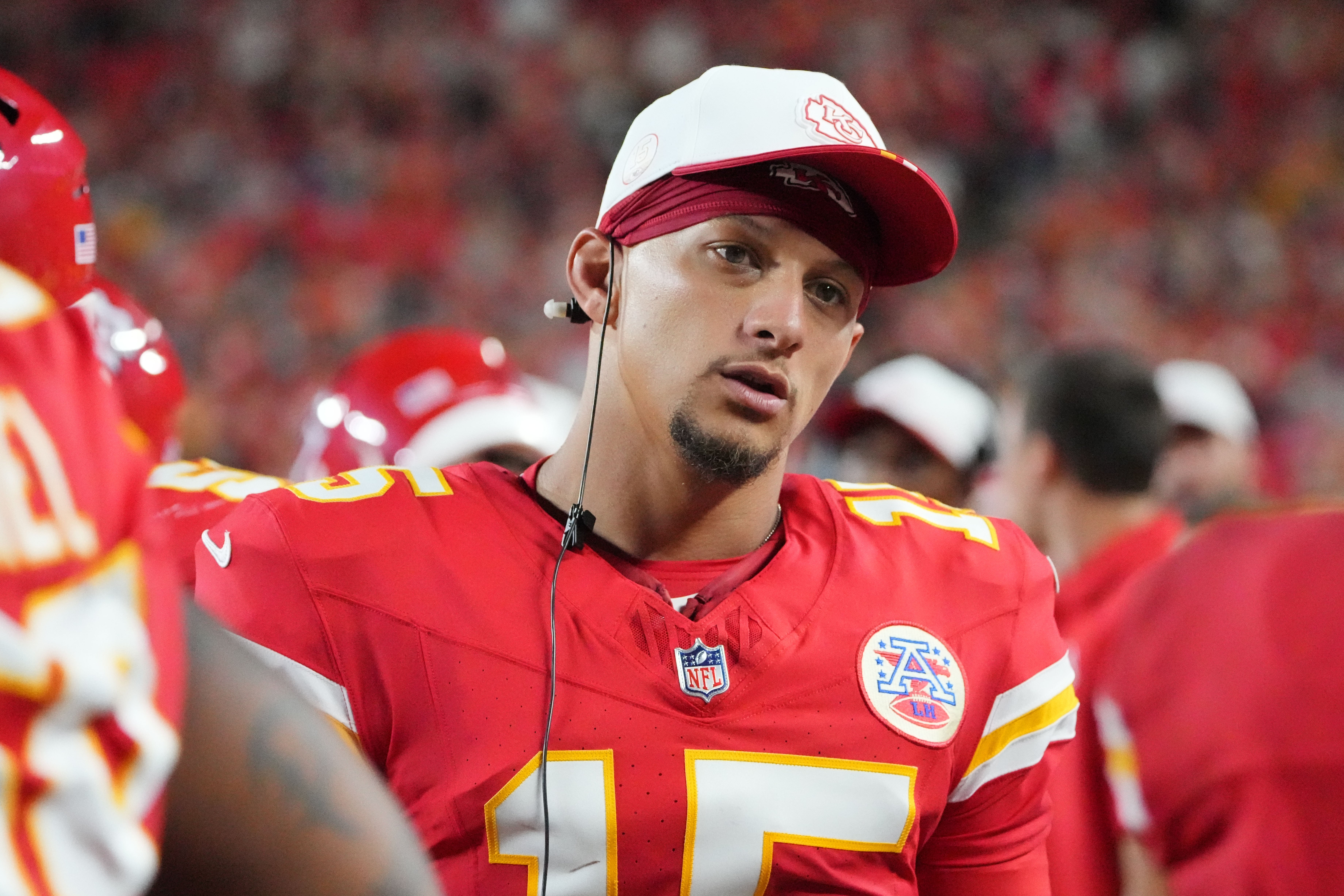 Kansas City Chiefs quarterback Patrick Mahomes (15) on the sidelines against the Chicago Bears during the game at GEHA Field at Arrowhead Stadium.