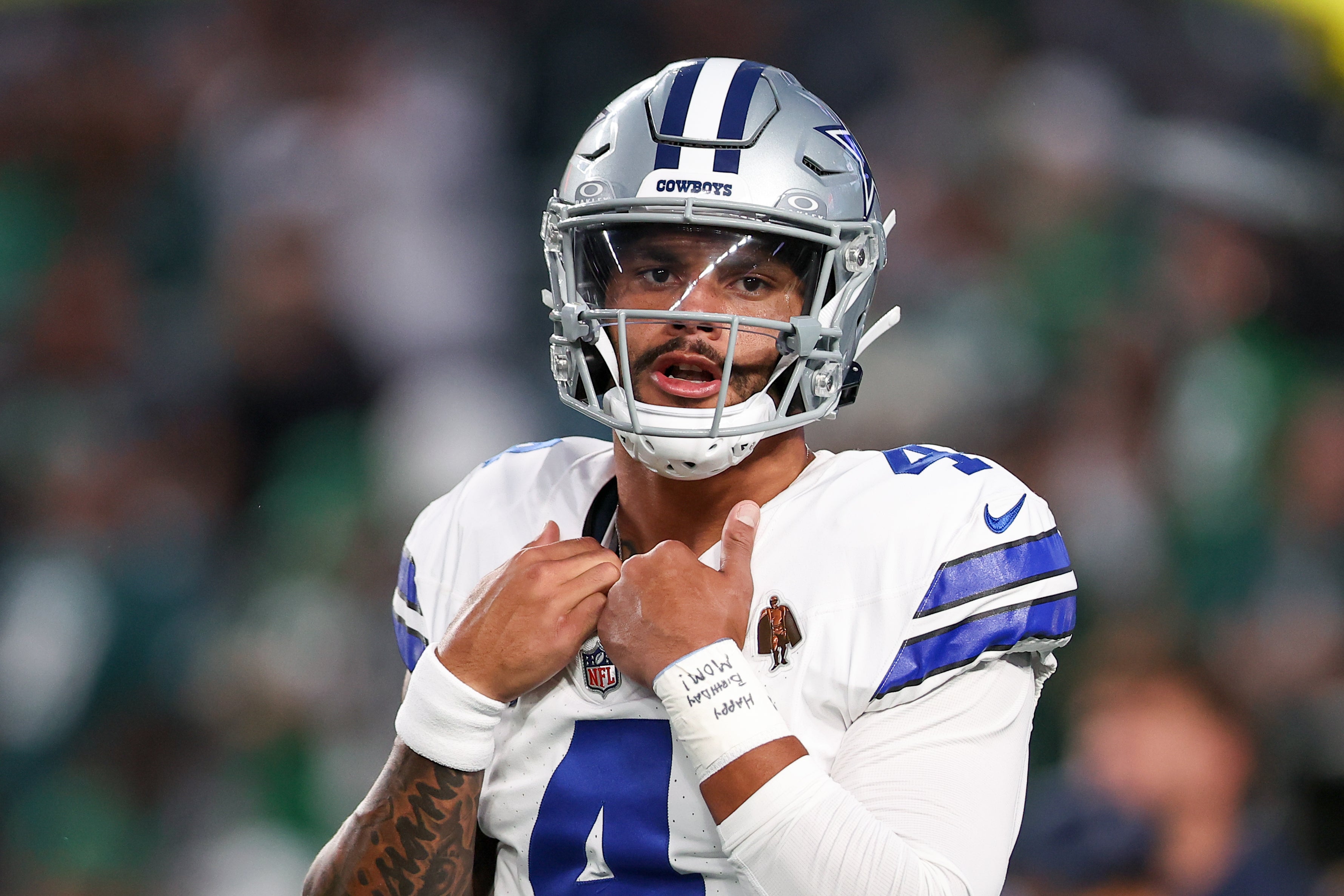 Dallas Cowboys quarterback Dak Prescott (4) looks on during warmups prior to the game against the Philadelphia Eagles at Lincoln Financial Field.