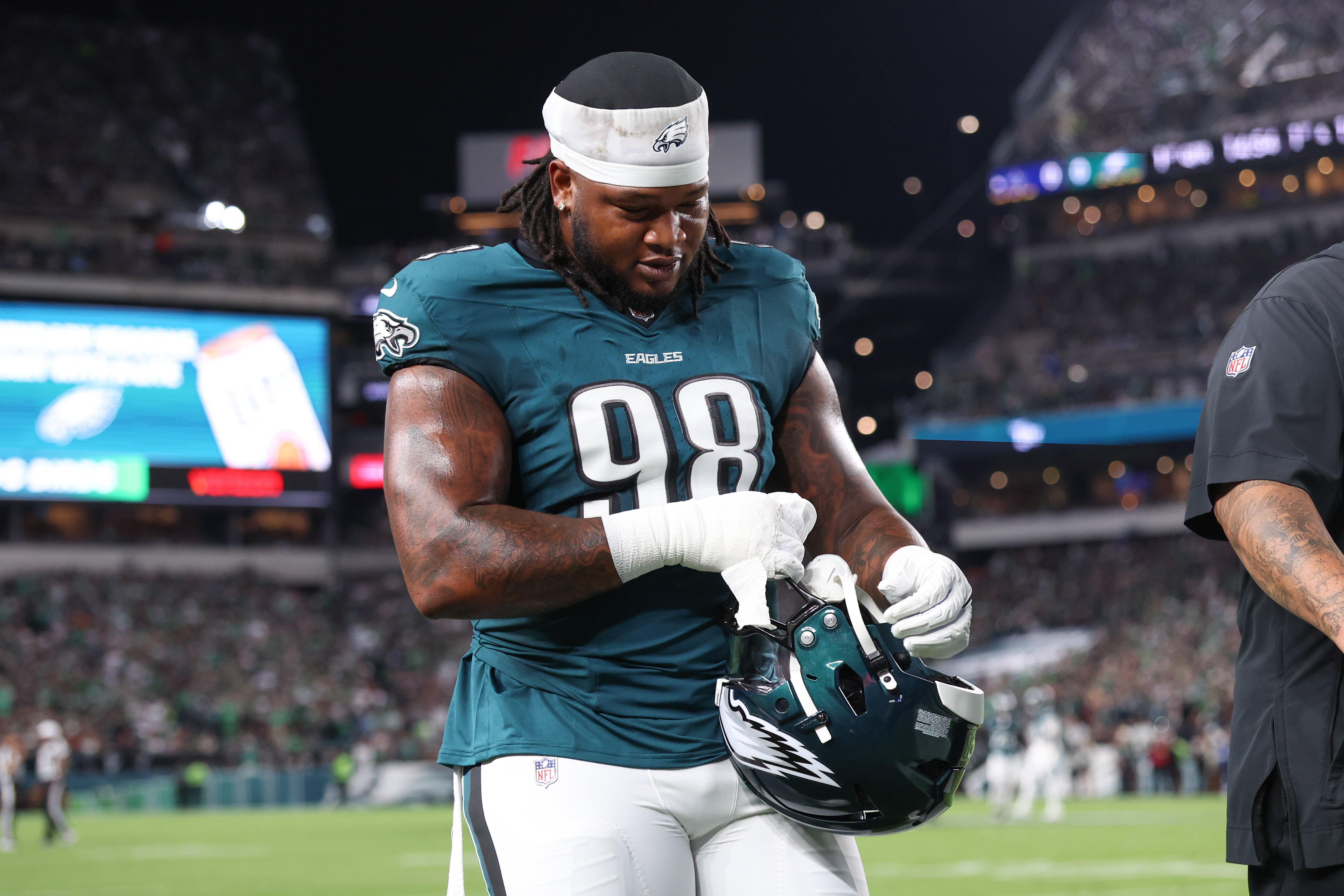 Philadelphia Eagles defensive tackle Jalen Carter (98) walks off the field after being ejected during the first quarter of the game against the Dallas Cowboys at Lincoln Financial Field.