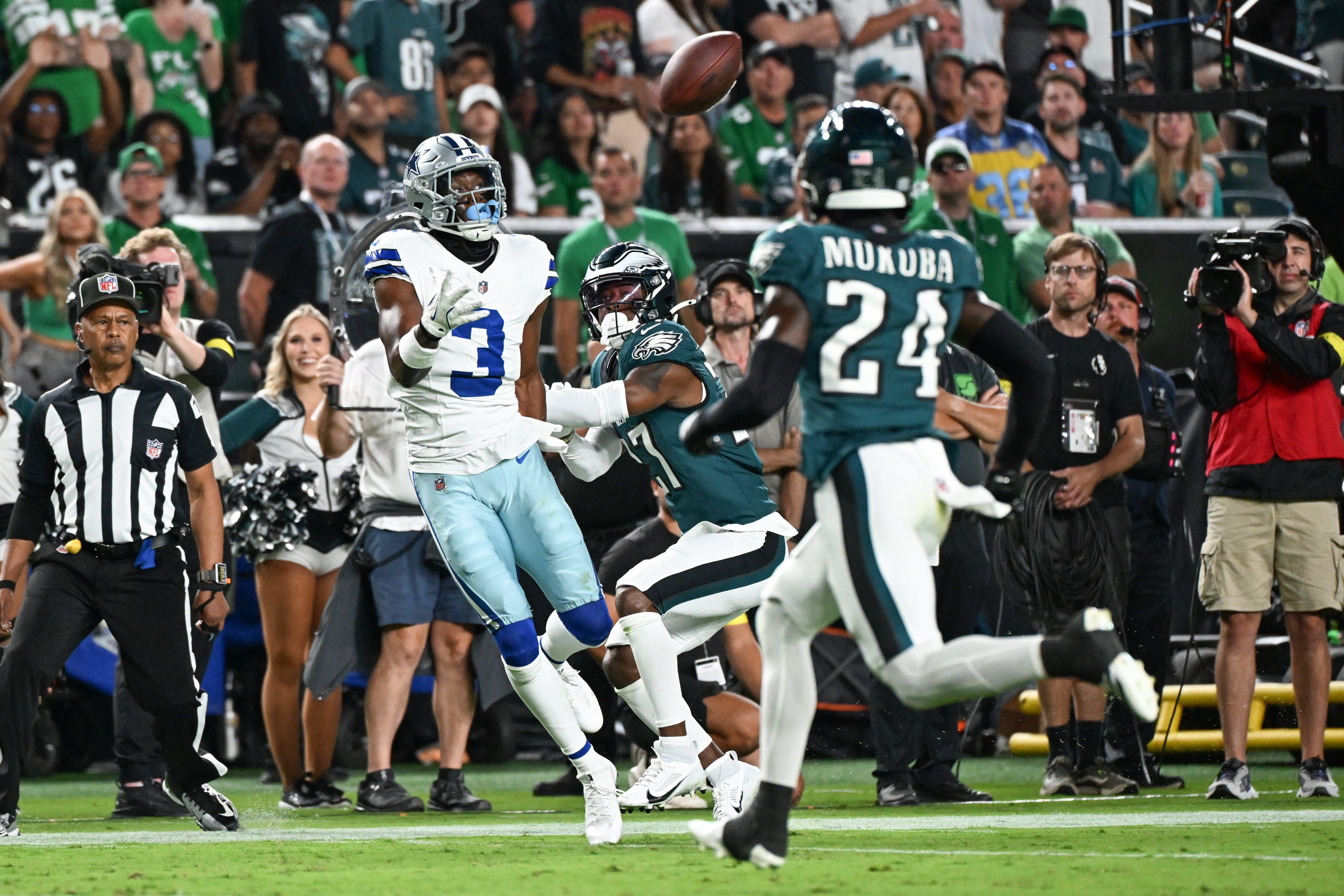 Sep 4, 2025; Philadelphia, Pennsylvania, USA; Dallas Cowboys wide receiver George Pickens (3) makes a reception defended by Philadelphia Eagles cornerback Quinyon Mitchell (27) during the first quarter of the game at Lincoln Financial Field.