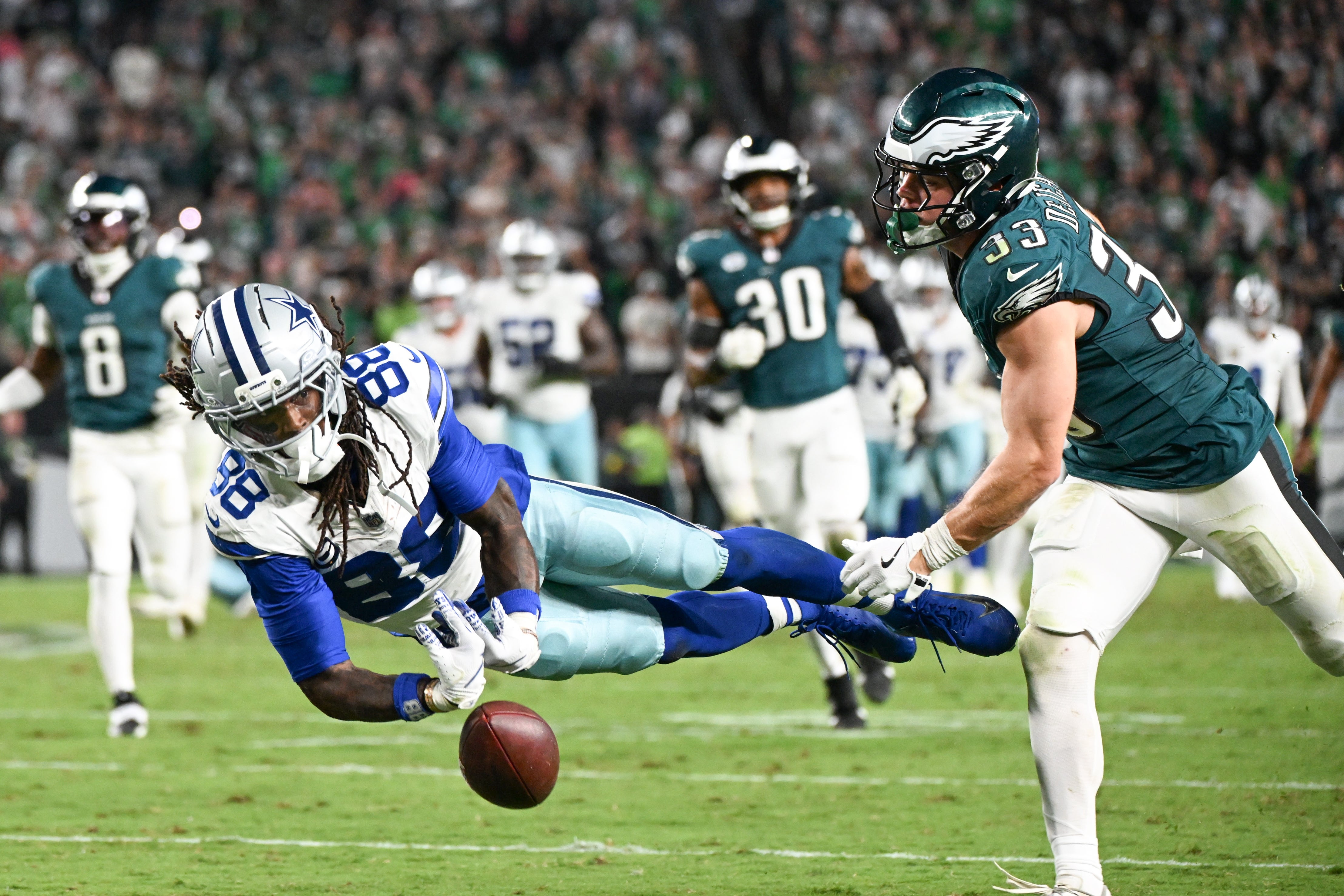 Dallas Cowboys wide receiver CeeDee Lamb (88) is unable to make a reception defended by Philadelphia Eagles cornerback Cooper DeJean (33) during the fourth quarter of the game at Lincoln Financial