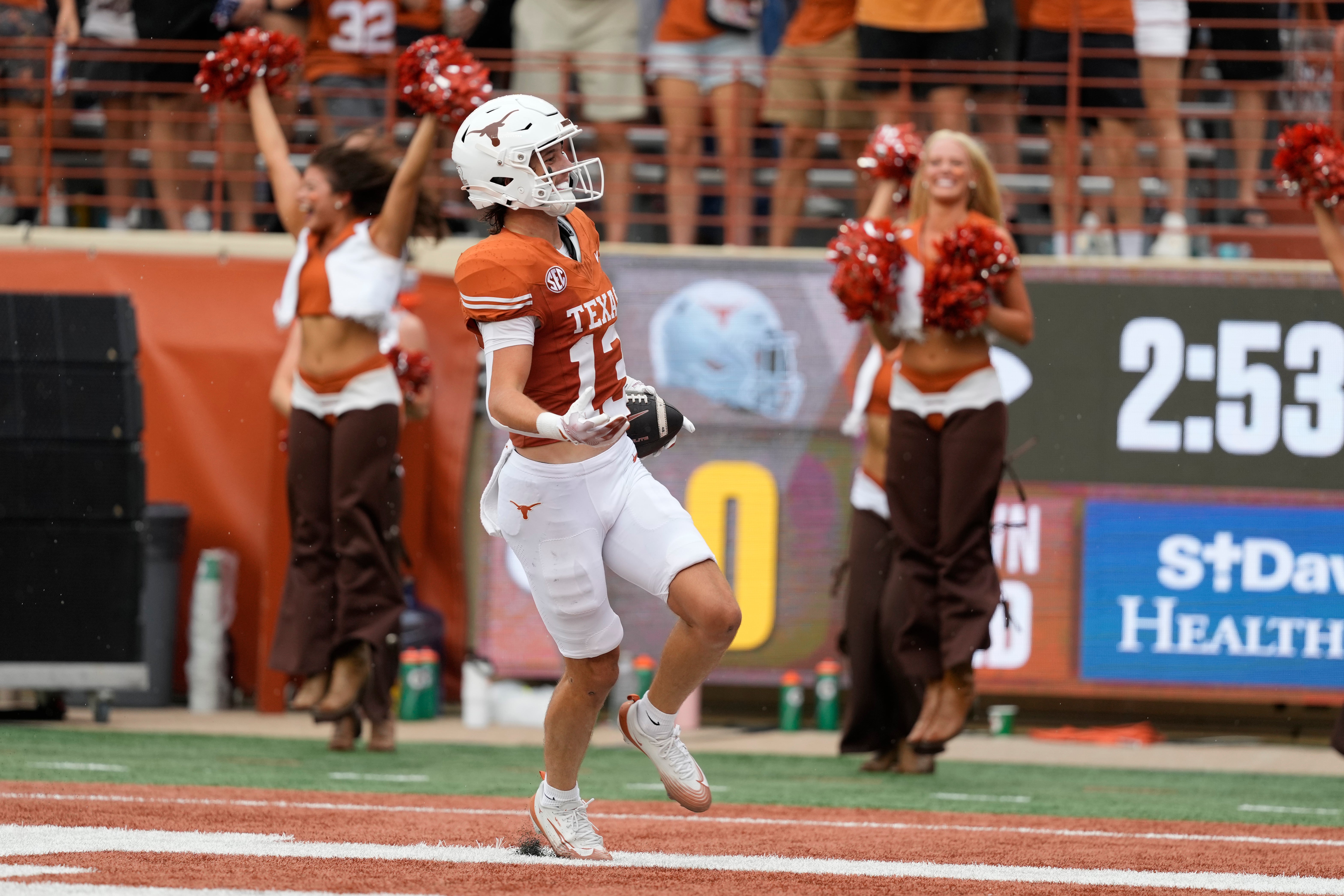 Sep 6, 2025; Austin, Texas, USA; Texas Longhorns wide receiver Parker Livingstone (13) reacts after scoring touchdown during the first half against the San Jose State Spartansat Darrell K Royal-Texas Memorial Stadium.