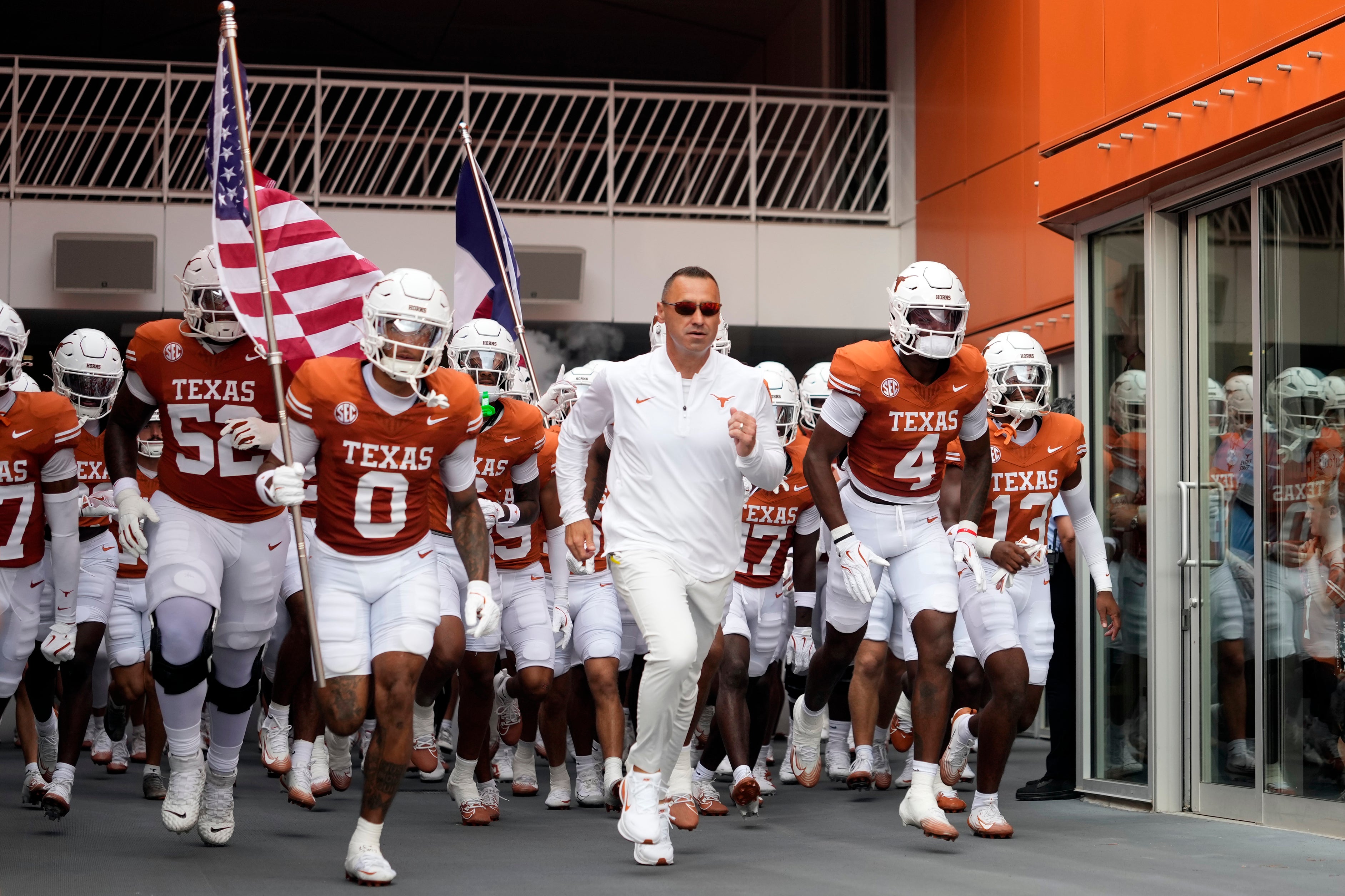Sep 6, 2025; Austin, Texas, USA; Texas Longhorns head coach Steve Sarkisian leads players on to the field before the game against the San Jose State Spartans at Darrell K Royal-Texas Memorial Stadium.