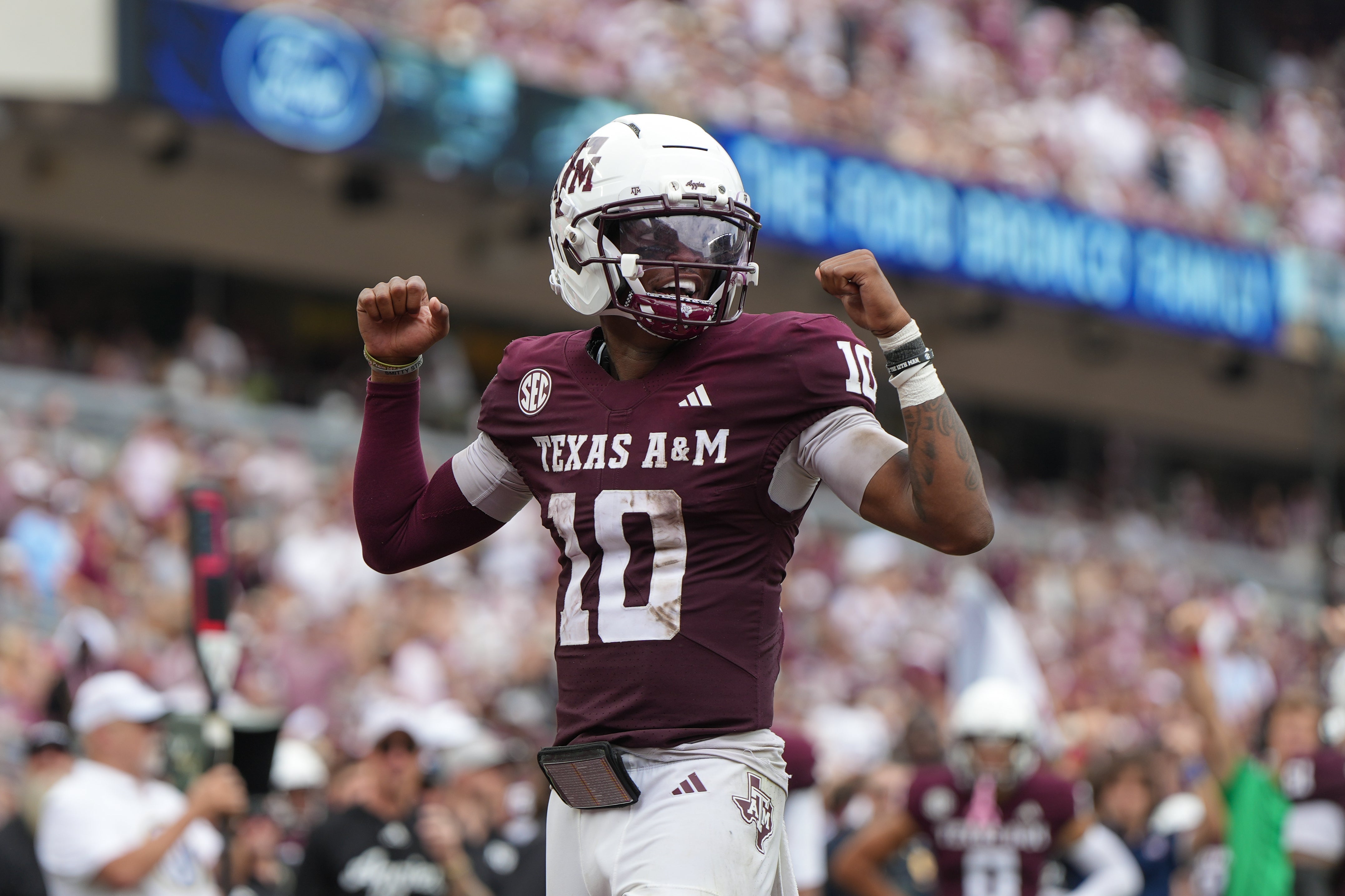 Sep 6, 2025; College Station, Texas, USA; Texas A&M Aggies quarterback Marcel Reed (10) celebrates after a touchdown pass during the second quarter against the Utah State Aggies at Kyle Field. M
