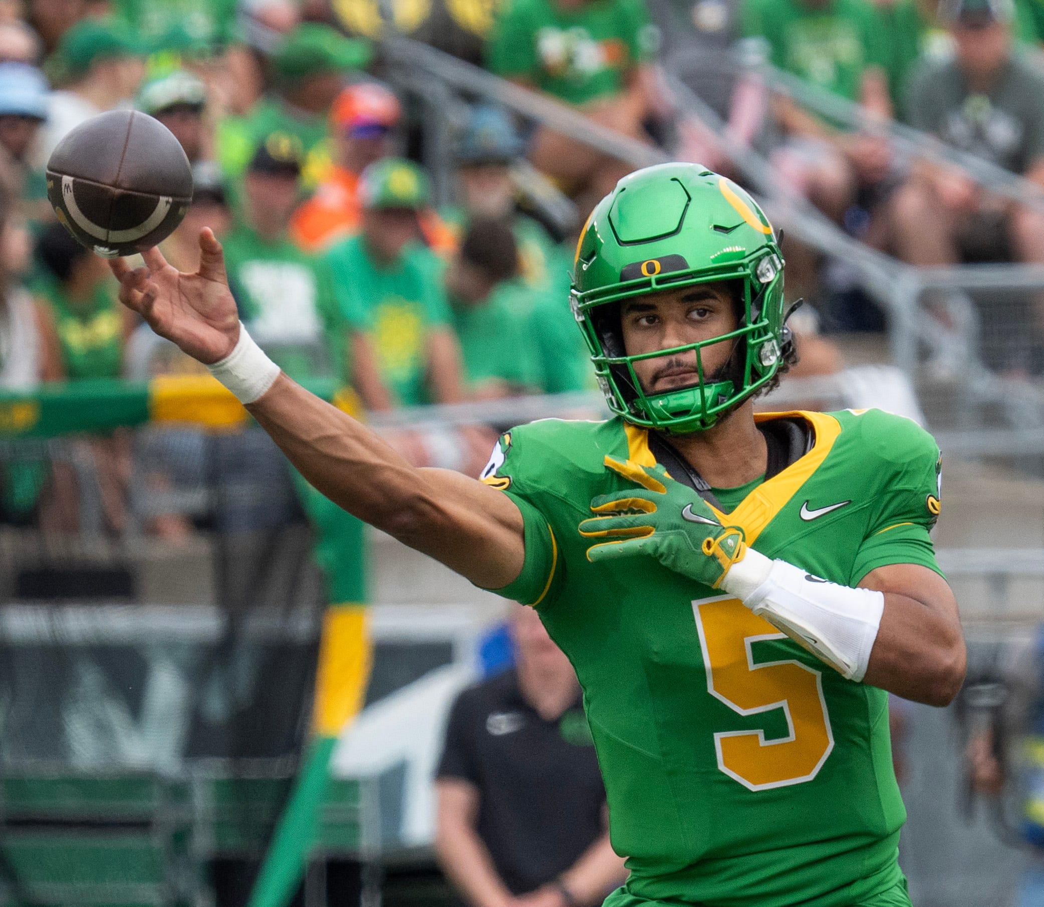 Oregon quarterback Dante Moore throws down field against Oklahoma State during the second quarter at Autzen.