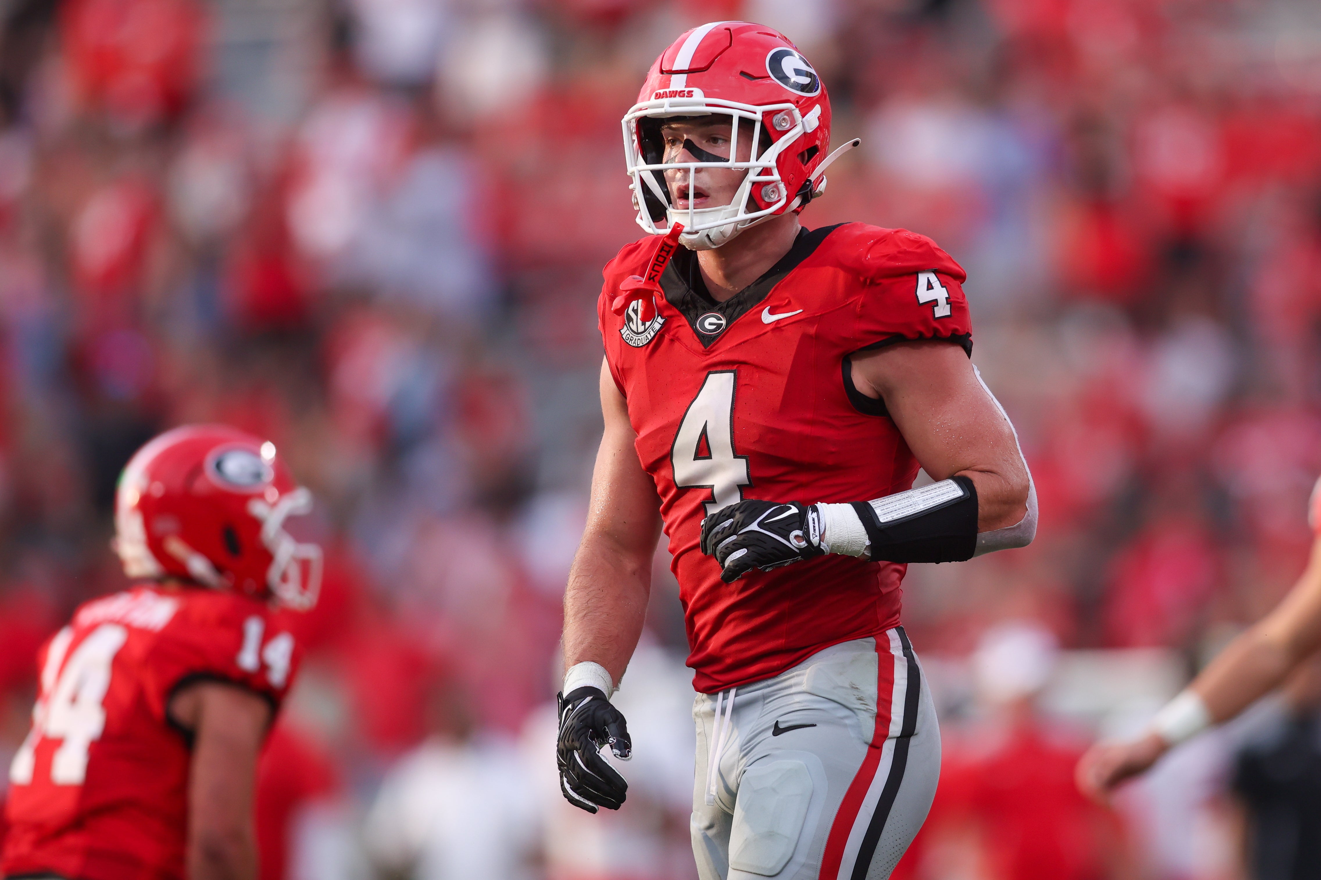 Georgia Bulldogs tight end Oscar Delp (4) in action against the Austin Peay Governors in the fourth quarter at Sanford Stadium.