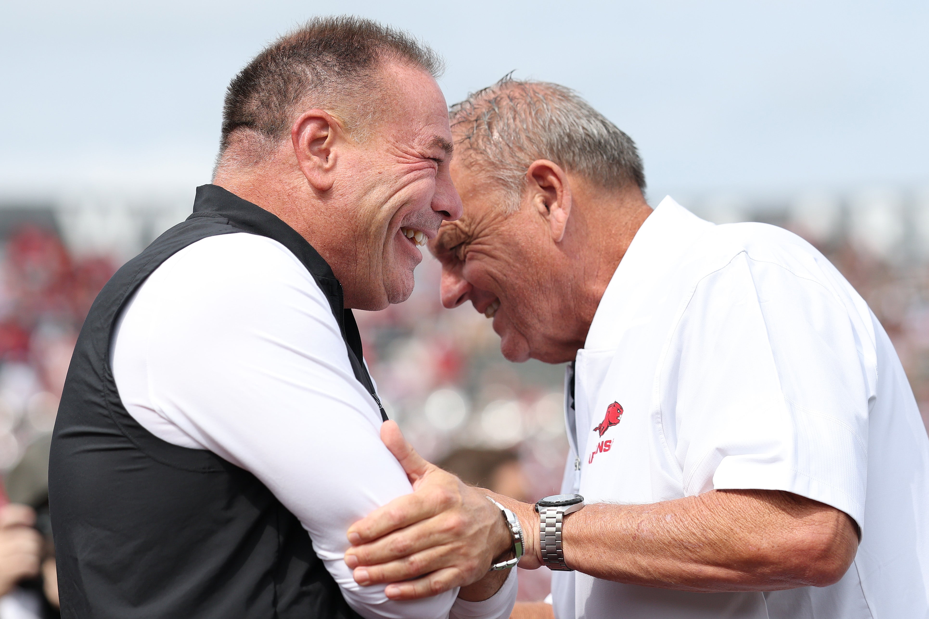 Arkansas Razorbacks head coach Sam Pittman Arkansas State head coach Butch Jones