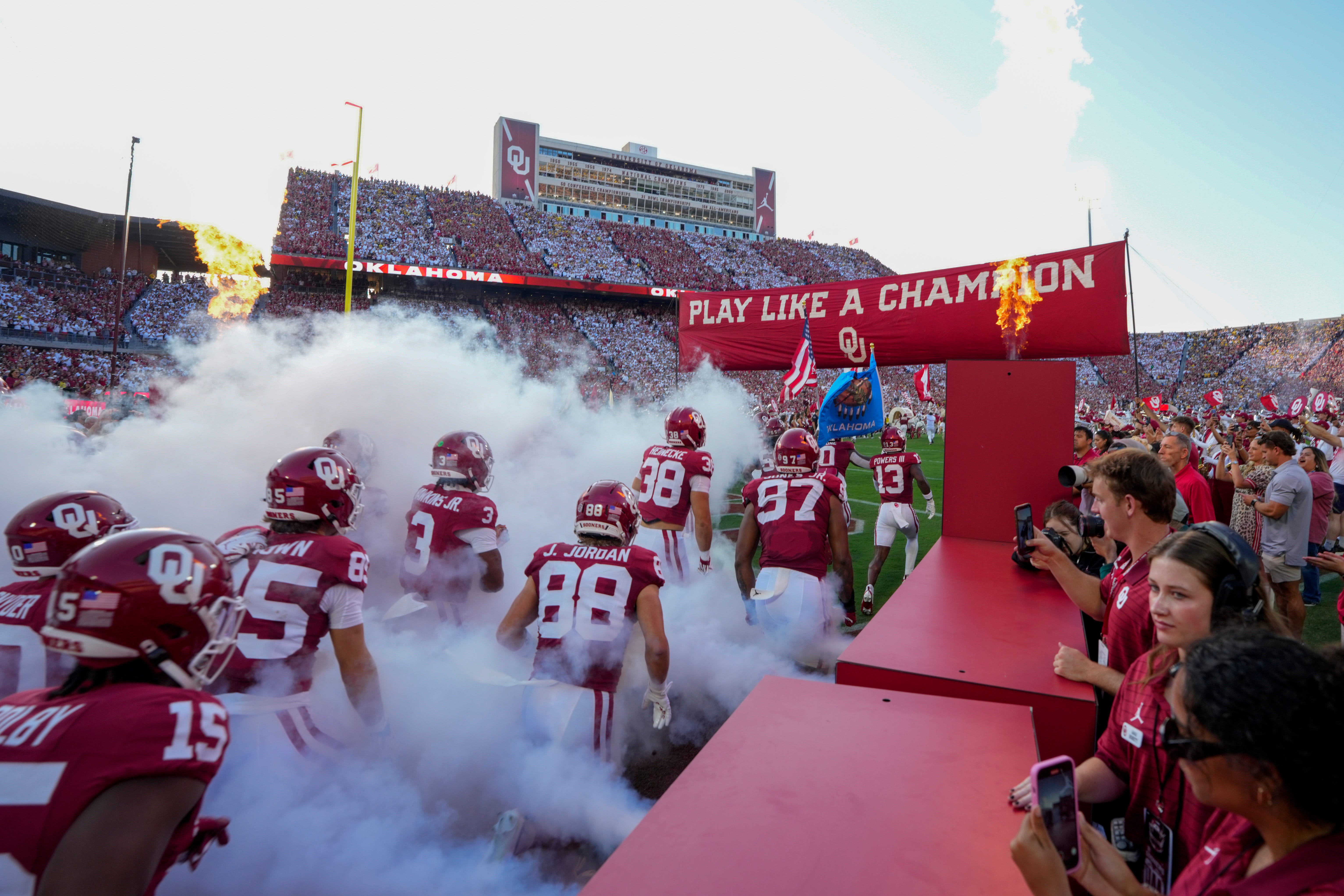 University of Oklahoma players take the field before a college football game between the University of Oklahoma Sooners (OU) and the University of Michigan Wolverines at Gaylord Family Ð Oklahoma Memorial Stadium in Norman, Okla., Saturday, Sept. 6, 2025. Oklahoma won 24-13.