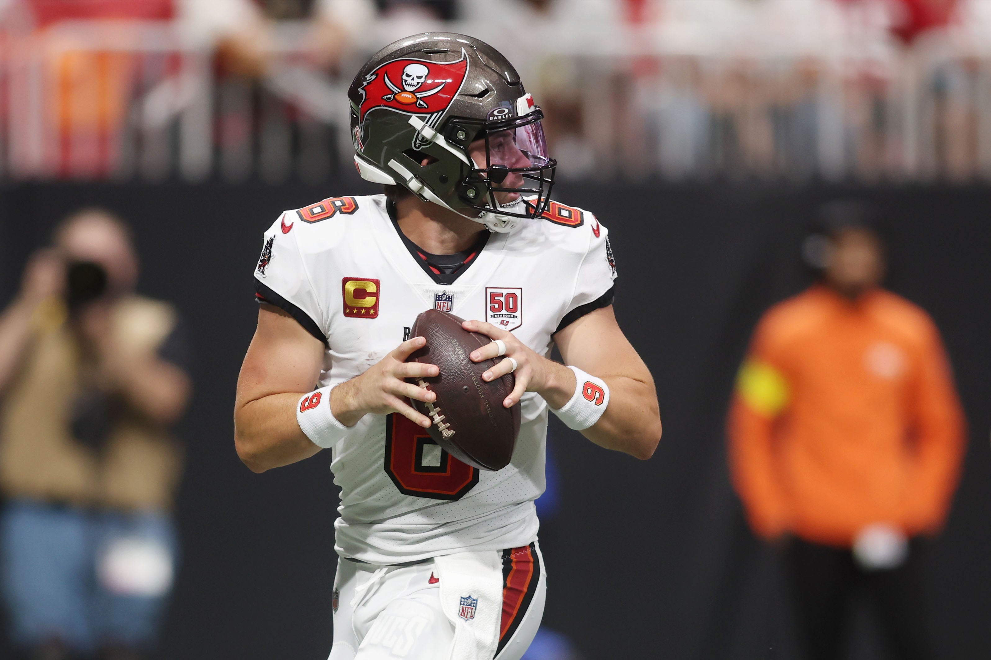 Sep 7, 2025; Atlanta, Georgia, USA; Tampa Bay Buccaneers quarterback Baker Mayfield (6) looks to pass the ball against the Atlanta Falcons during the first quarter at Mercedes-Benz Stadium.
