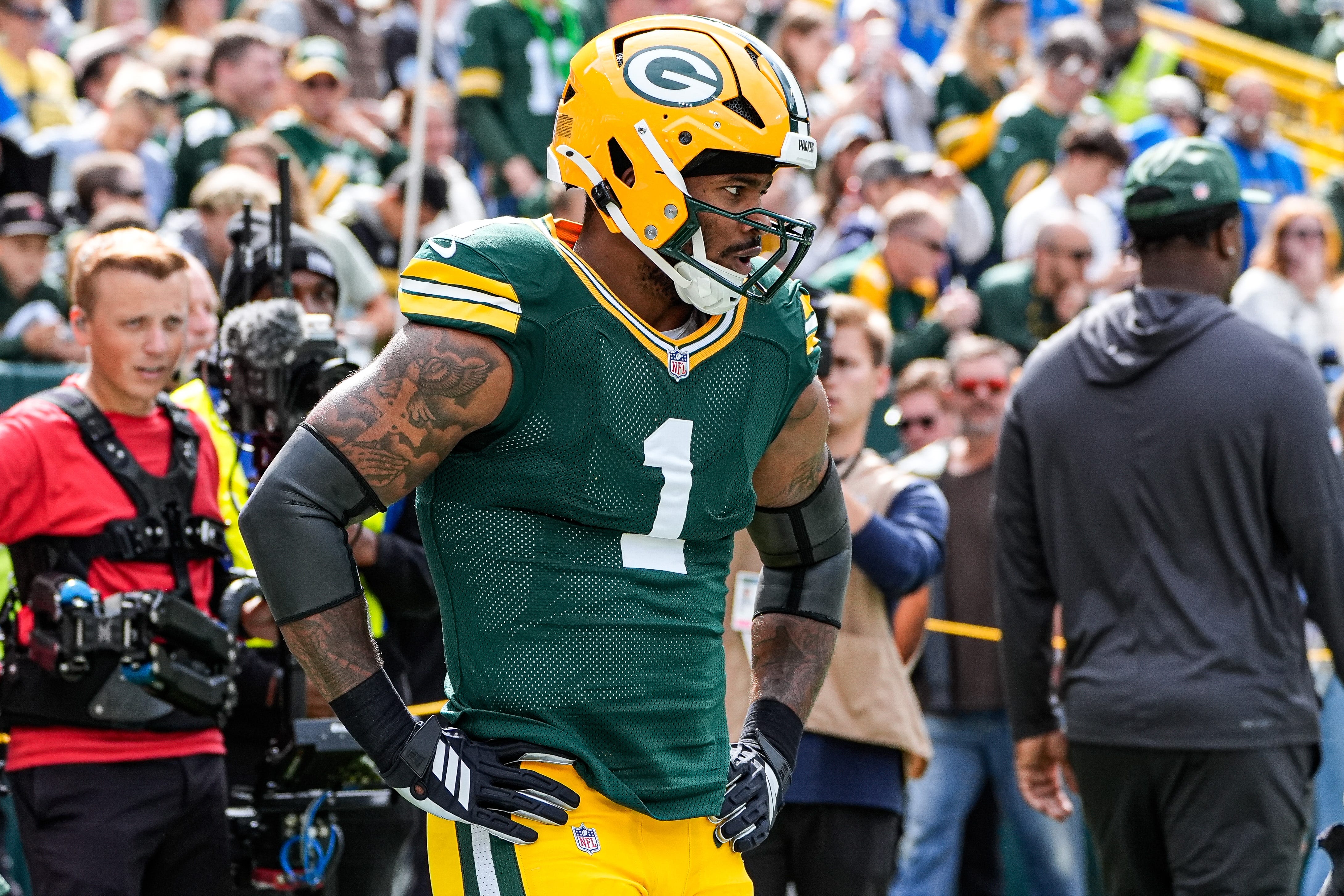 Green Bay Packers defensive end Micah Parsons (1) warms up at Lambeau Field in Green Bay, Wis., on Sunday, September 7, 2025.