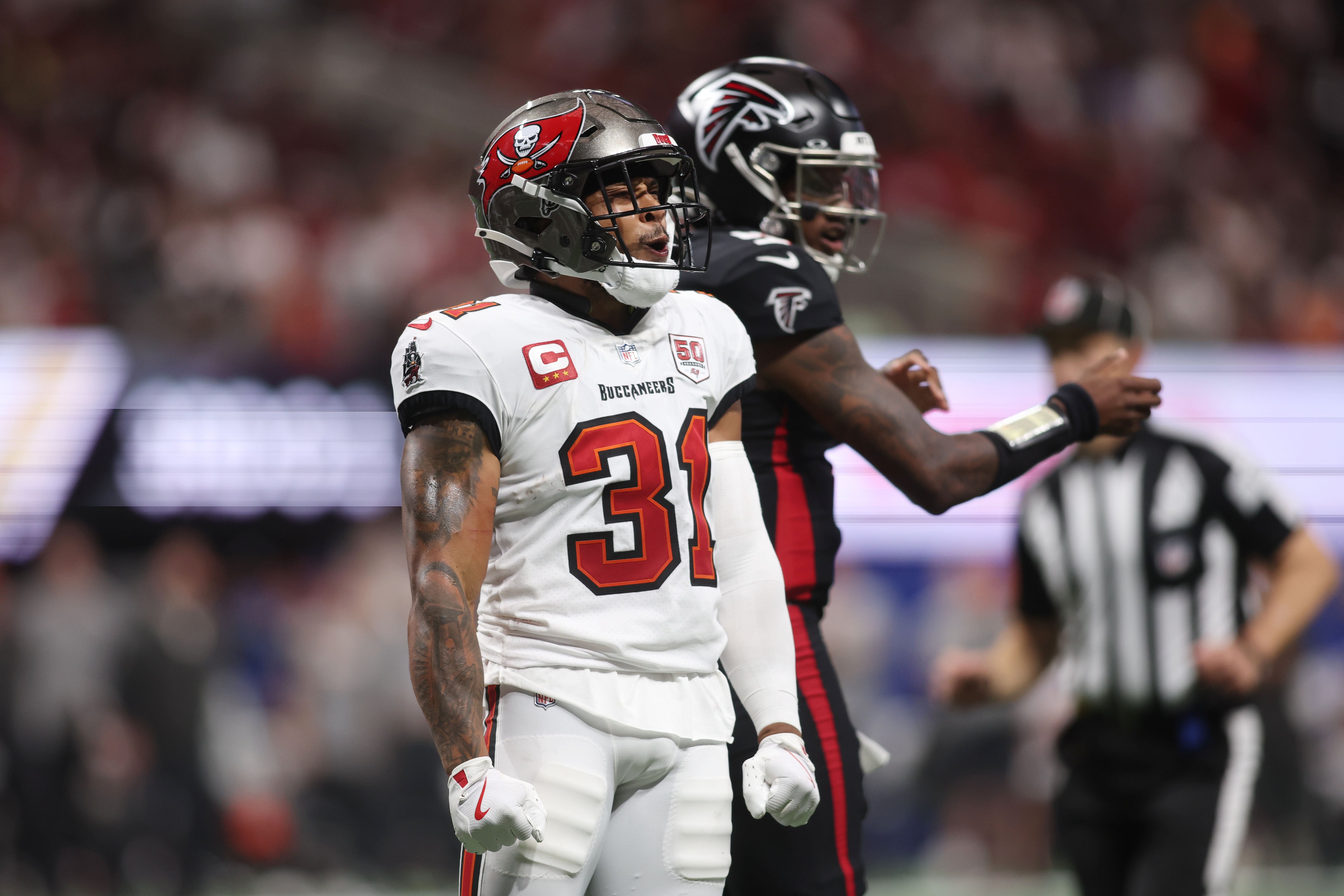 Sep 7, 2025; Atlanta, Georgia, USA; Tampa Bay Buccaneers safety Antoine Winfield Jr. (31) reacts after a play against the Atlanta Falcons during the fourth quarter at Mercedes-Benz Stadium.