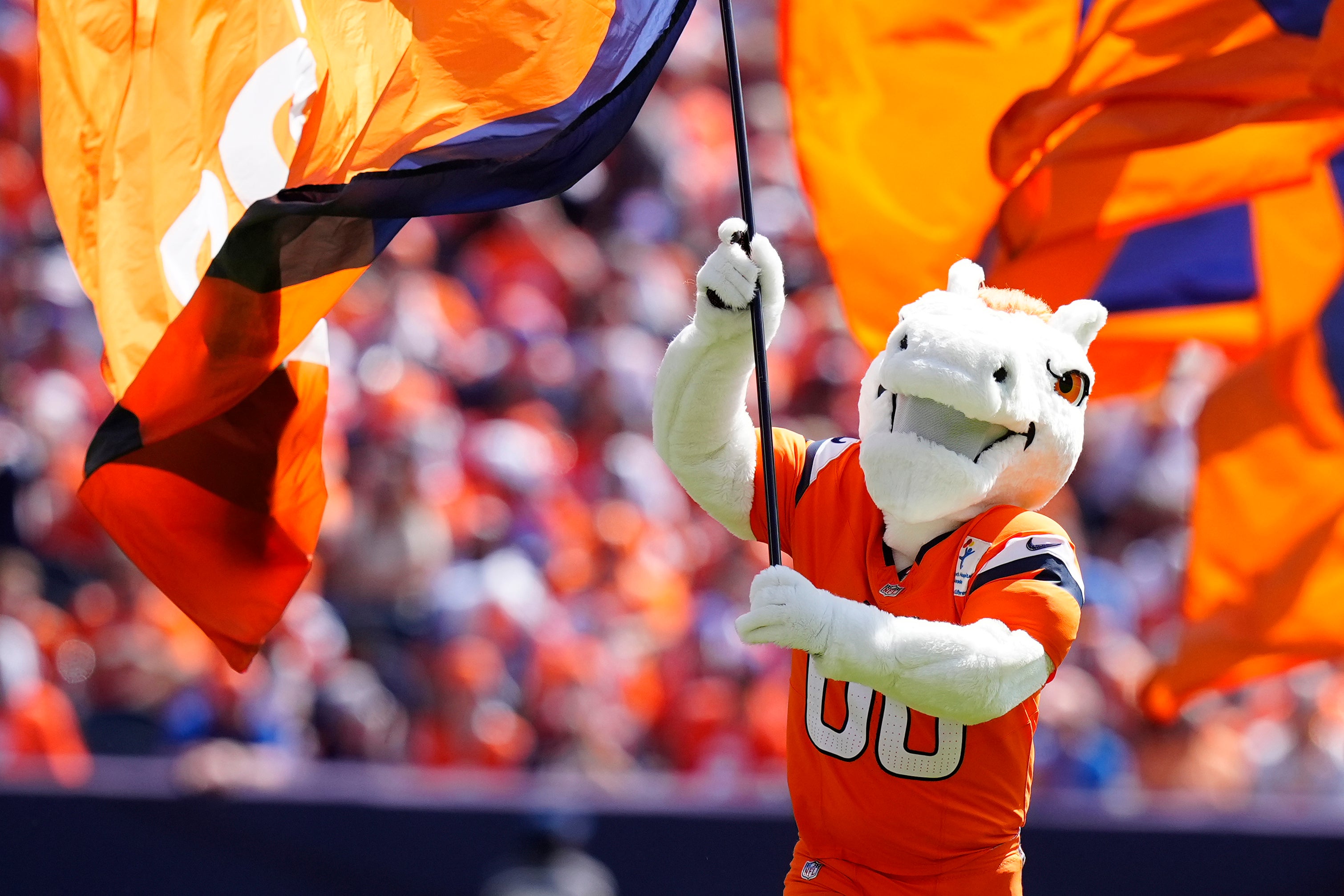 Sep 7, 2025; Denver, Colorado, USA; The Denver mascot performs in the first half at Empower Field at Mile High.